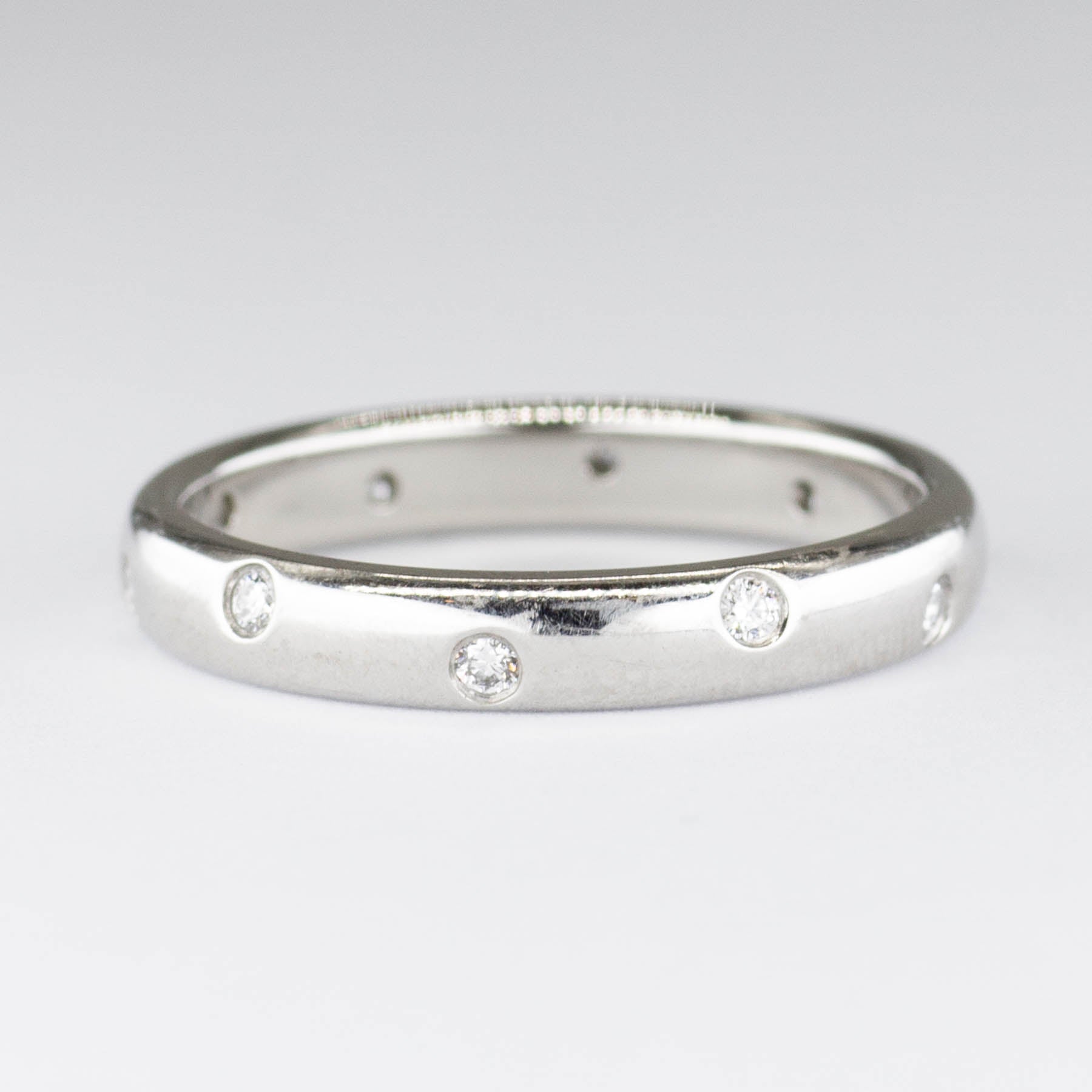 Tiffany & Co. Diamond Platinum Etoile Ring - 0.10 Carat Total Weight - Size 5.25 - Elegant Engagement & Wedding Band for Women