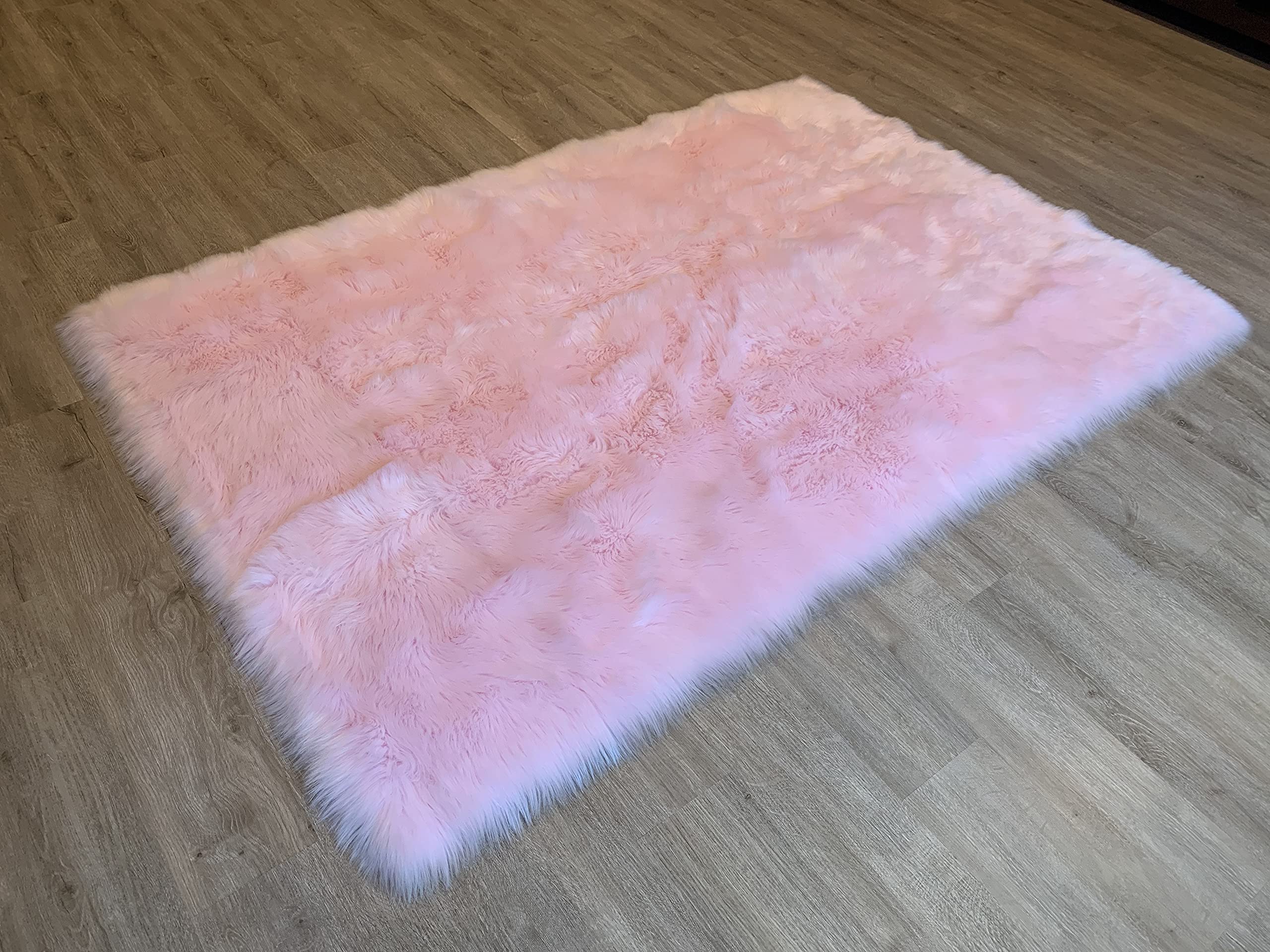 LAMBZY Faux Sheepskin Rug - Super Soft Hypoallergenic Shaggy Carpet for Living Room & Nursery (4x6 Feet, Pink) - Cozy Home Decor for Bedroom, Kids Room & Nursery