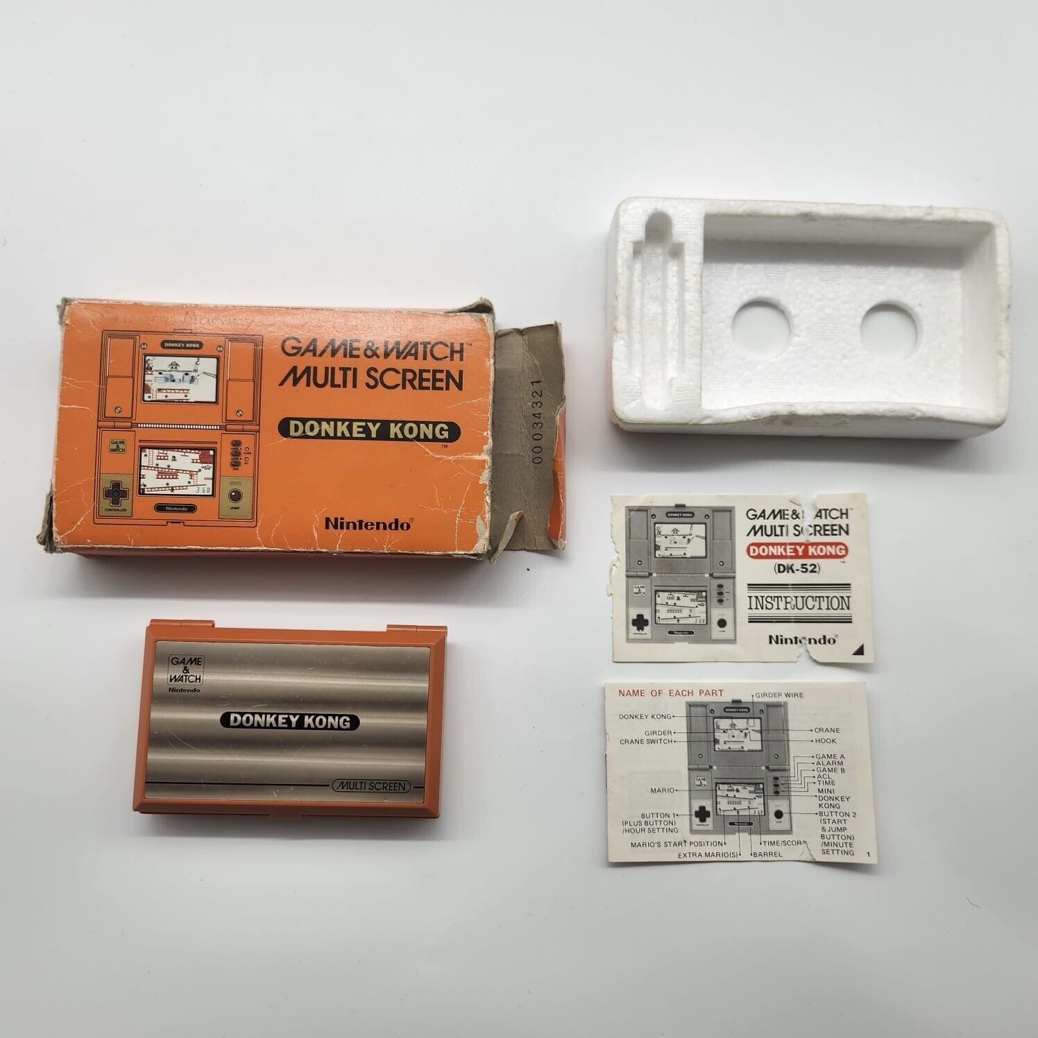 Vintage Donkey Kong Multi-Screen Nintendo Game & Watch Handheld Console - Classic Retro Gaming Collectible (Boxed 25F4) - Perfect for Gaming Enthusiasts & Nostalgic Gift Ideas