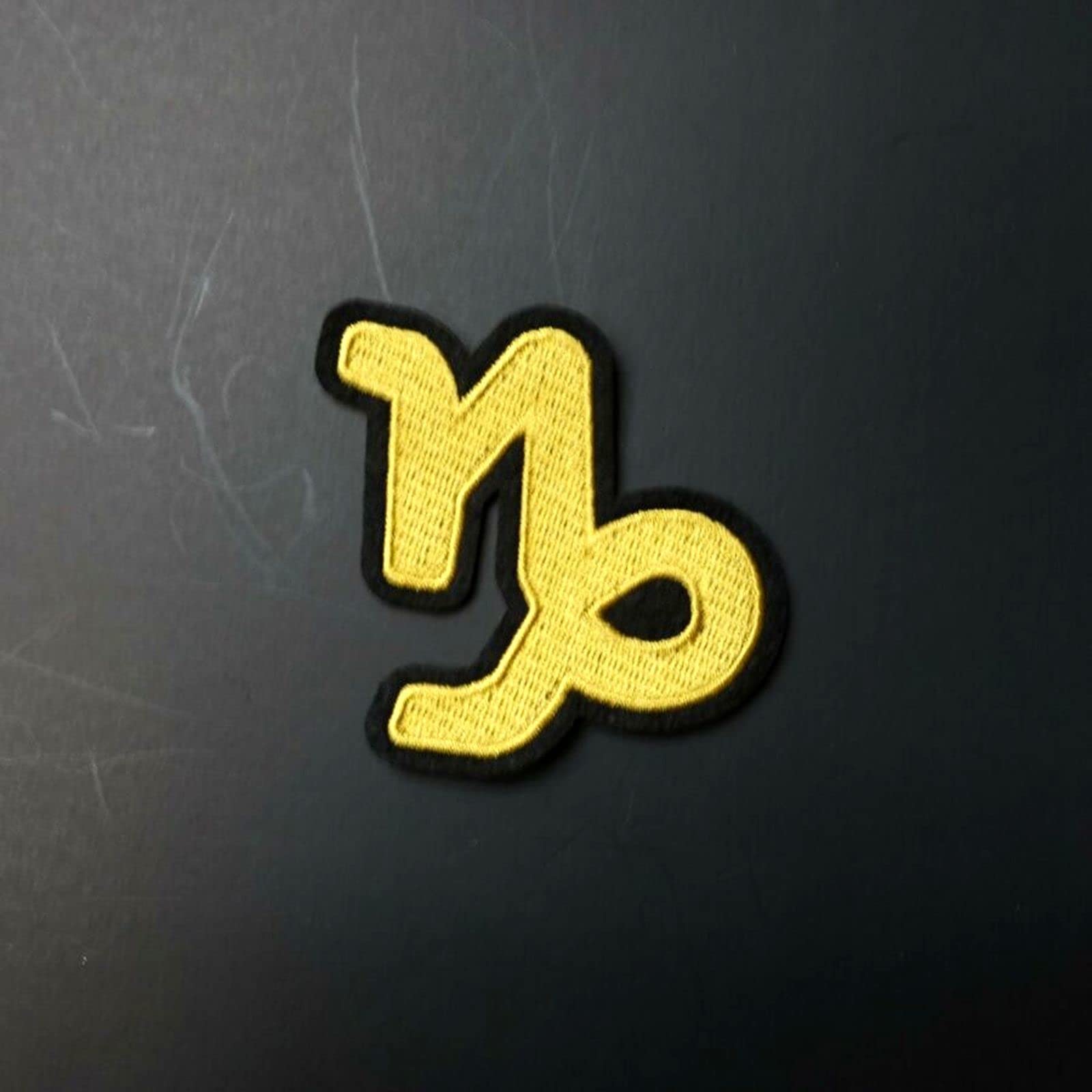 Black & Gold Zodiac Sign Iron-On Patch - Embroidered Capricorn Sew On Applique for Jackets, Hats, Backpacks | DIY Clothing Repair & Craft Projects | Perfect for Astrology Lovers & Personalized Fashion