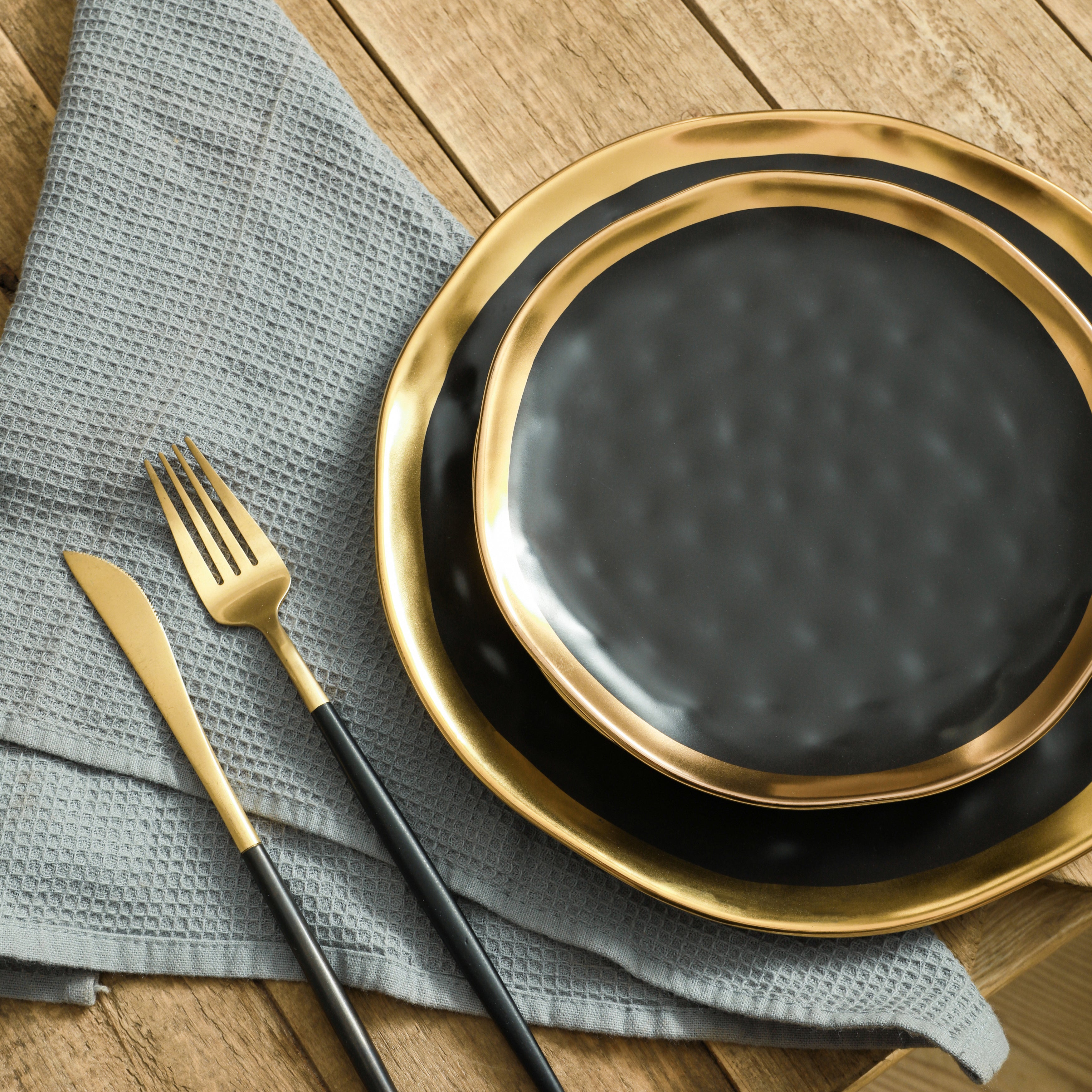 Florian Porcelain Dinnerware Set - 16-Piece Elegant Black Dinner Plates, Bowls & Mugs - Durable Chip-Resistant Dishware for Everyday Use & Formal Dining