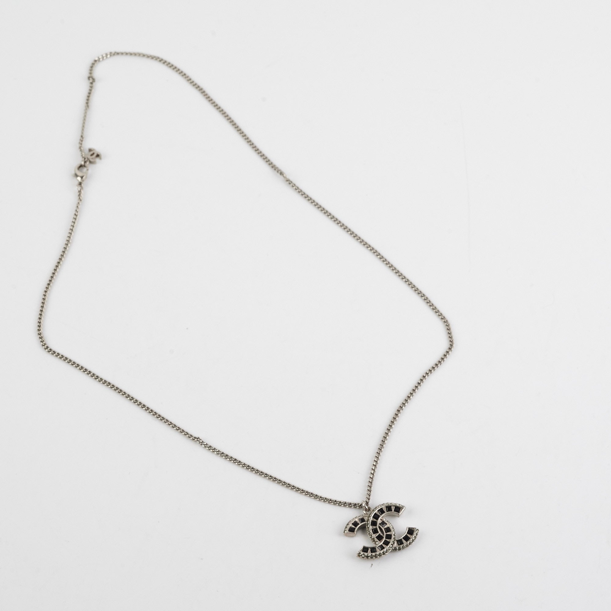Chanel CC Logo Pendant Necklace in Sterling Silver - Elegant Jewelry for Women, Perfect for Parties, Weddings & Everyday Wear