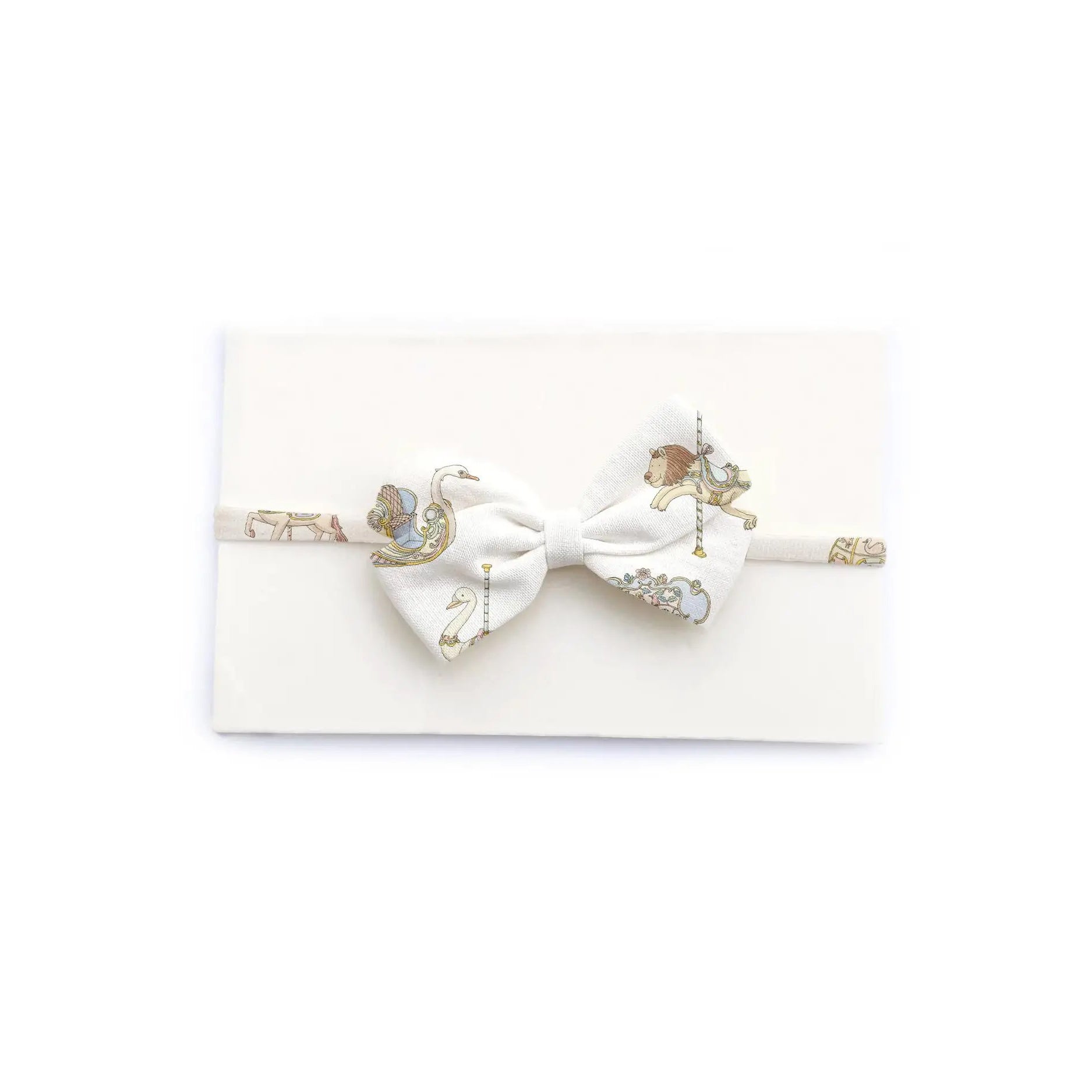 Atelier Choux Bow Carousel - Luxury Baby Blanket for Newborns & Infants | Soft Organic Cotton Swaddle Wrap | Perfect for Nursery, Gifts & Photo Shoots