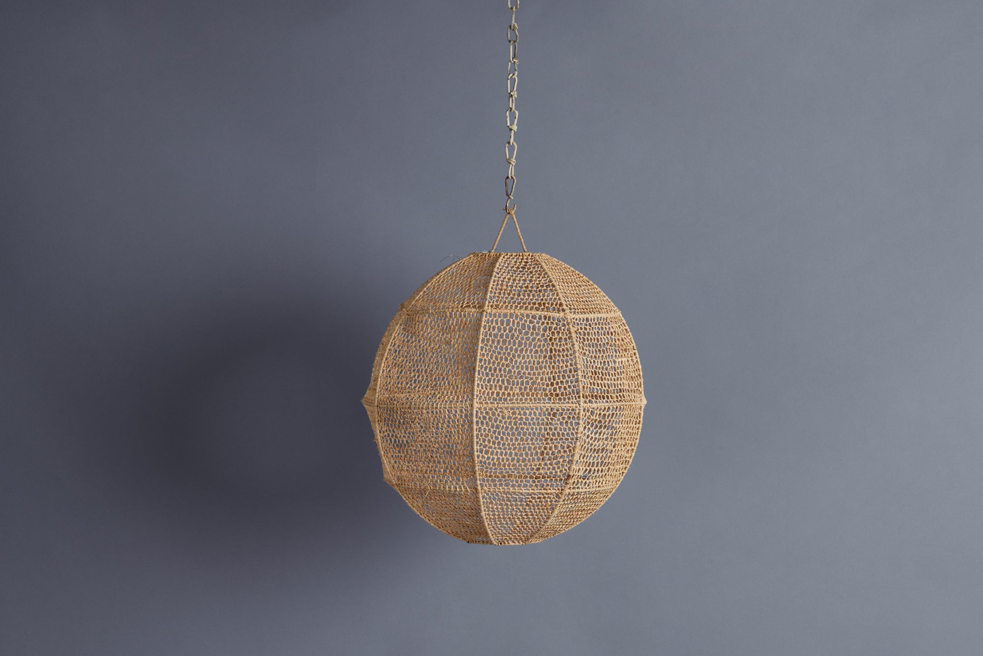 Medium Open Work Ball Shaped Raffia Hanging Light - Natural Woven Rattan Pendant Lamp for Boho Living Room, Bedroom, or Patio Decor