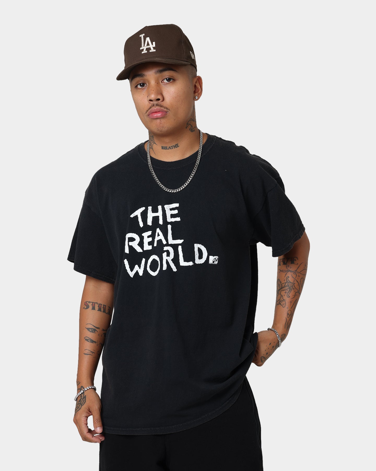 Vintage MTV The Real World Graphic T-Shirt - Black Wash Distressed Style - Perfect for Casual Wear, Retro Parties & 90s Nostalgia Fans