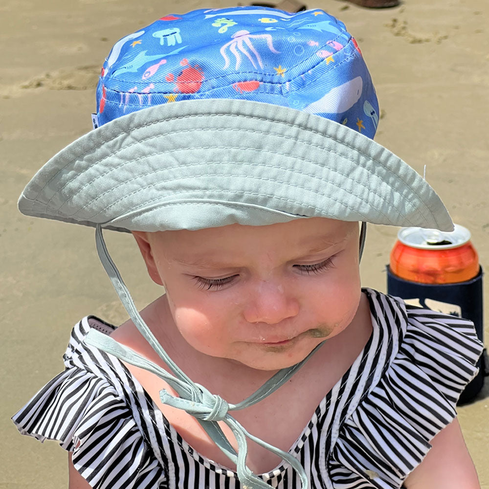 Rheos Salty UV Protection Baby Bucket Hat - Sun Shield for Infants & Toddlers - Perfect for Beach, Pool, and Outdoor Adventures