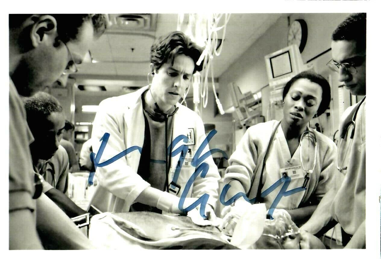 Hugh Grant Autographed 4.25x6.5 Black & White Photo - 