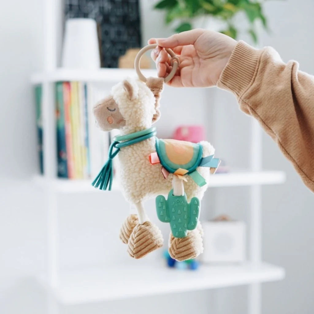 Itzy Ritzy Link & Love Teething Activity Toy for Babies - Soft Chewable Sensory Toy with Textured Surface for Soothing Sore Gums - Perfect for Teething Infants, On-the-Go Play & Developmental Stimulation