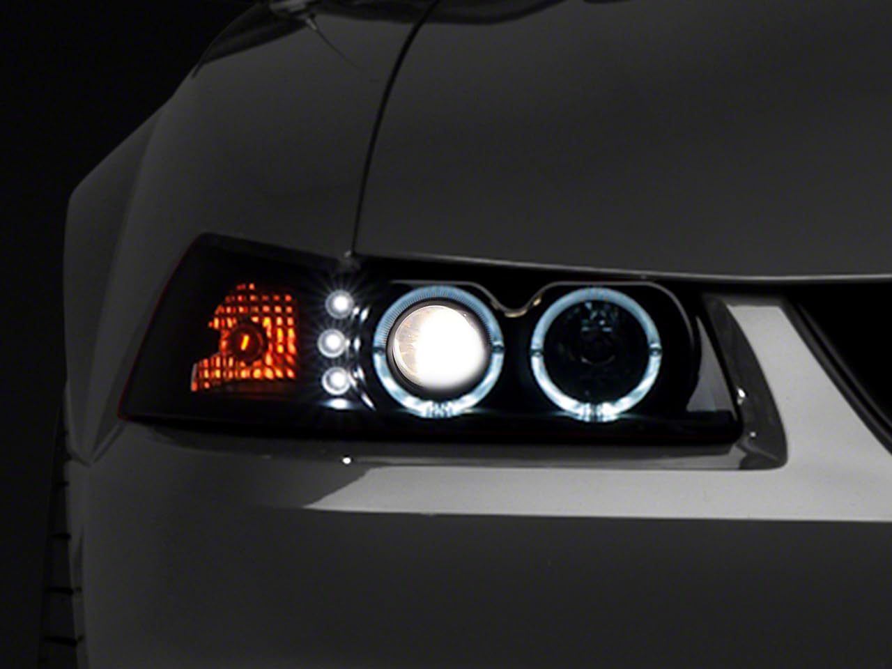 Raxiom Smoked Projector Headlights with Dual LED Halo for Ford Mustang 1999-2004 - Upgrade Your Night Driving & Style
