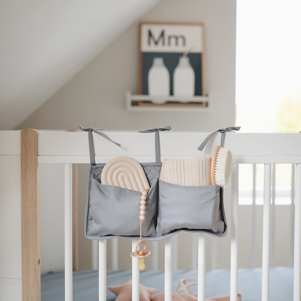 Mushie Crib Pocket Organizer - Breathable Mesh Storage for Baby Essentials | Nursery Organization | Tradewinds Collection | Perfect for Diapers, Wipes & Pacifiers in the Crib