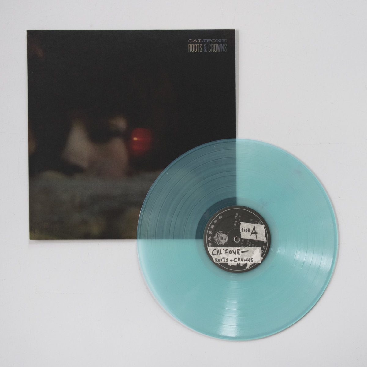 **Califone Roots & Crowns - Limited Edition Ice Age Blue Vinyl Record | Indie Folk & Alternative Rock Music | Perfect for Collectors & Vinyl Enthusiasts**