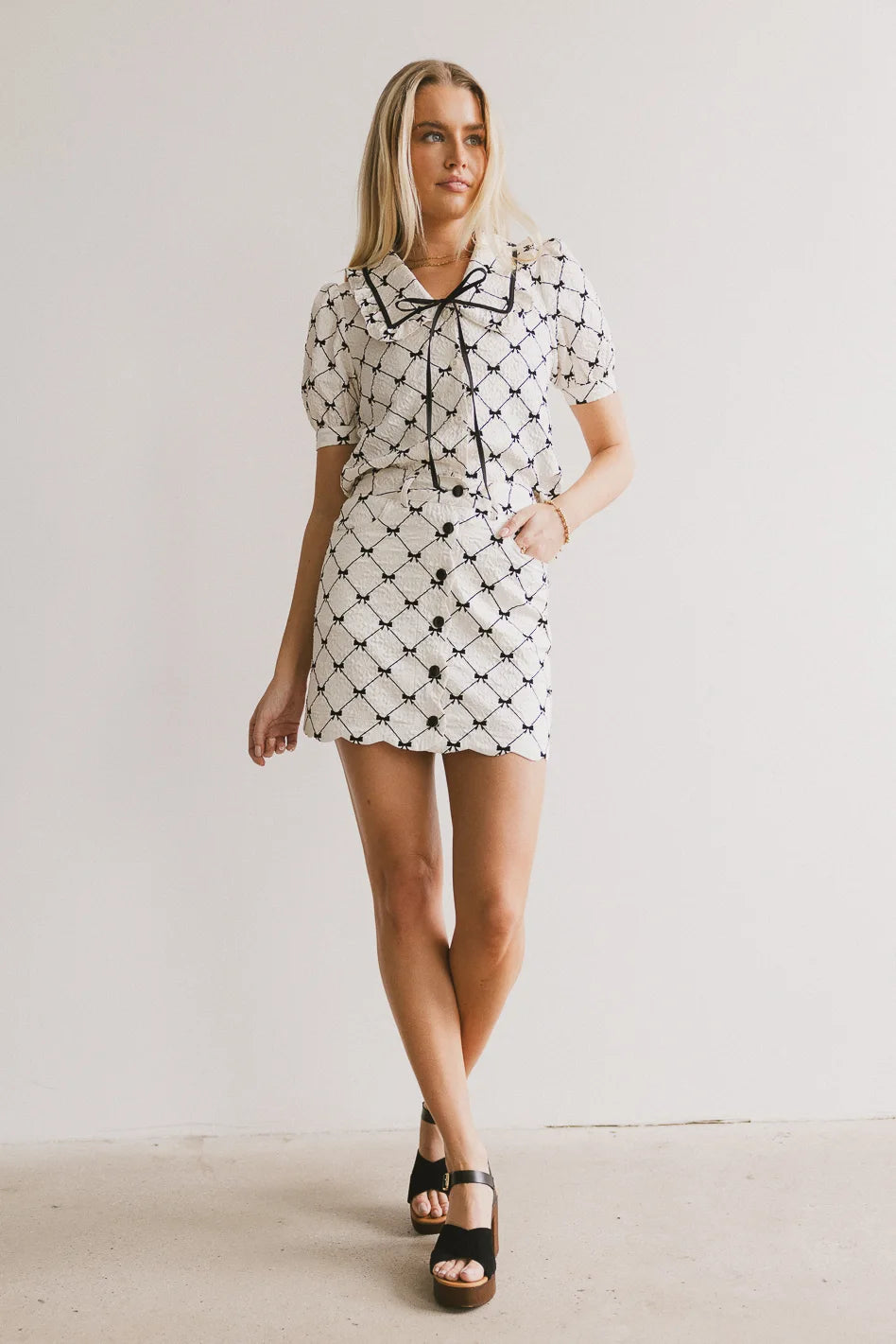 Maia Bow Mini Skirt - Women's Floral Print Pleated Skirt with Bow Detail | Perfect for Summer Outfits, Date Nights & Casual Wear