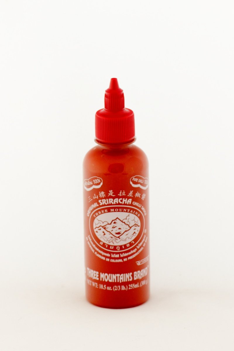 Original Three Mountains Sriracha Hot Chili Sauce - 10.5 Oz Bottle | Authentic Thai Flavor for Cooking, Dipping & Spicy Food Lovers | Perfect for Pho, Noodles, Wings & Asian Dishes