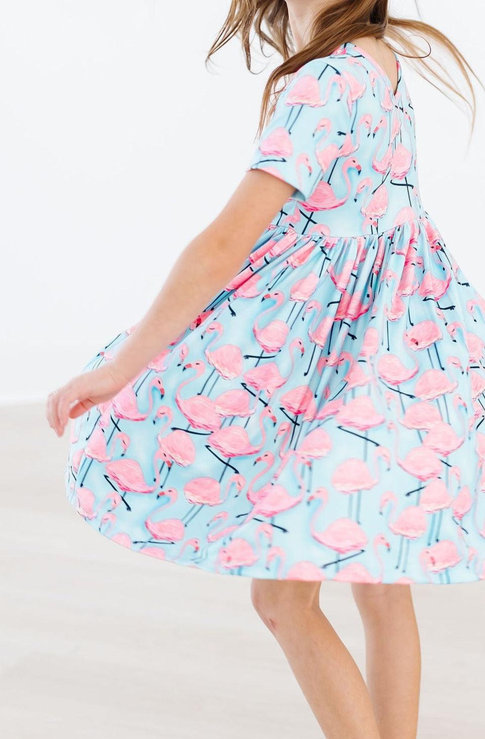 Stylish Pink Flamingo Short Sleeve Pocket Twirl Dress for Women - Perfect for Summer Parties, Beach Vacations & Casual Outings