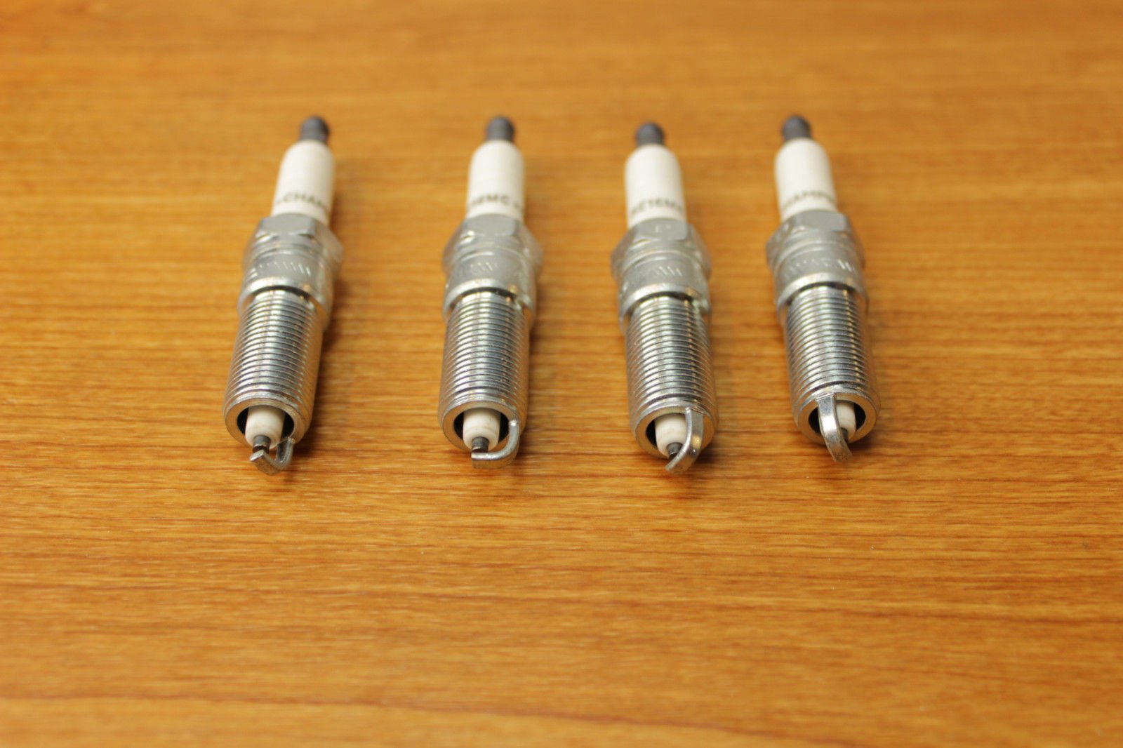 Chrysler Dodge Caravan Jeep Wrangler Spark Plugs Set of 4 - OEM Replacement Parts for Smooth Engine Performance | Perfect for Off-Roading, Daily Commuting & Engine Maintenance