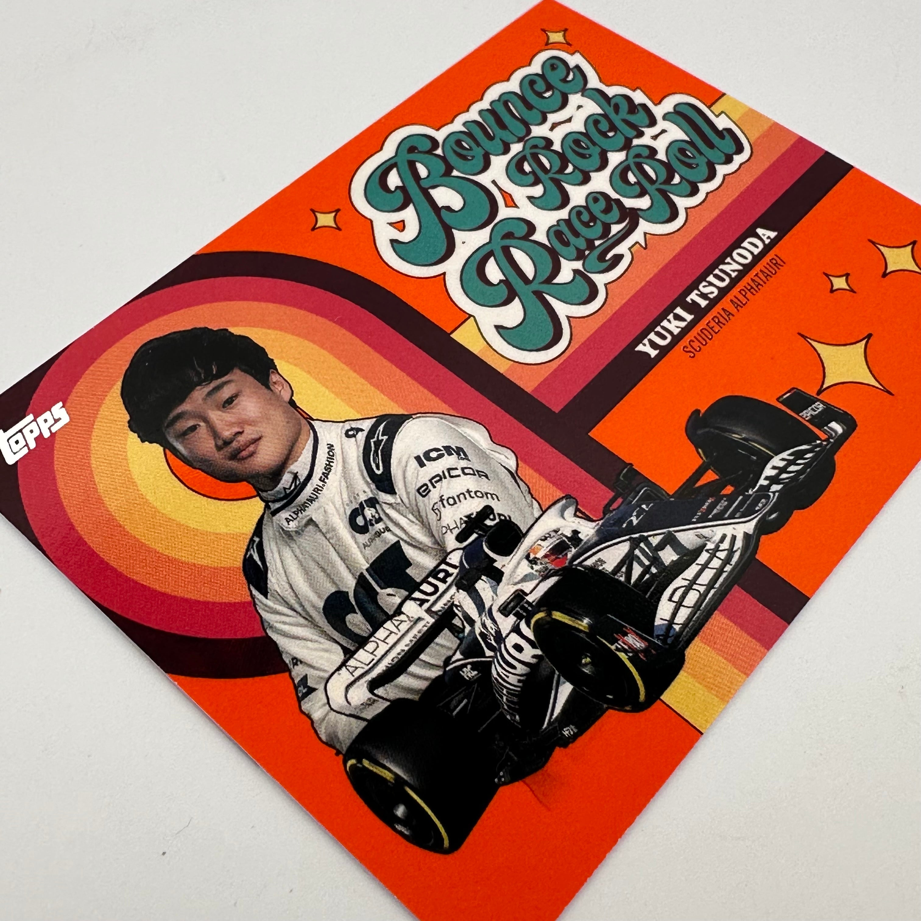 2022 Topps Formula 1 Yuki Tsunoda Orange Bounce Rock Race Roll Trading Card - Perfect for F1 Collectors and Racing Fans Display