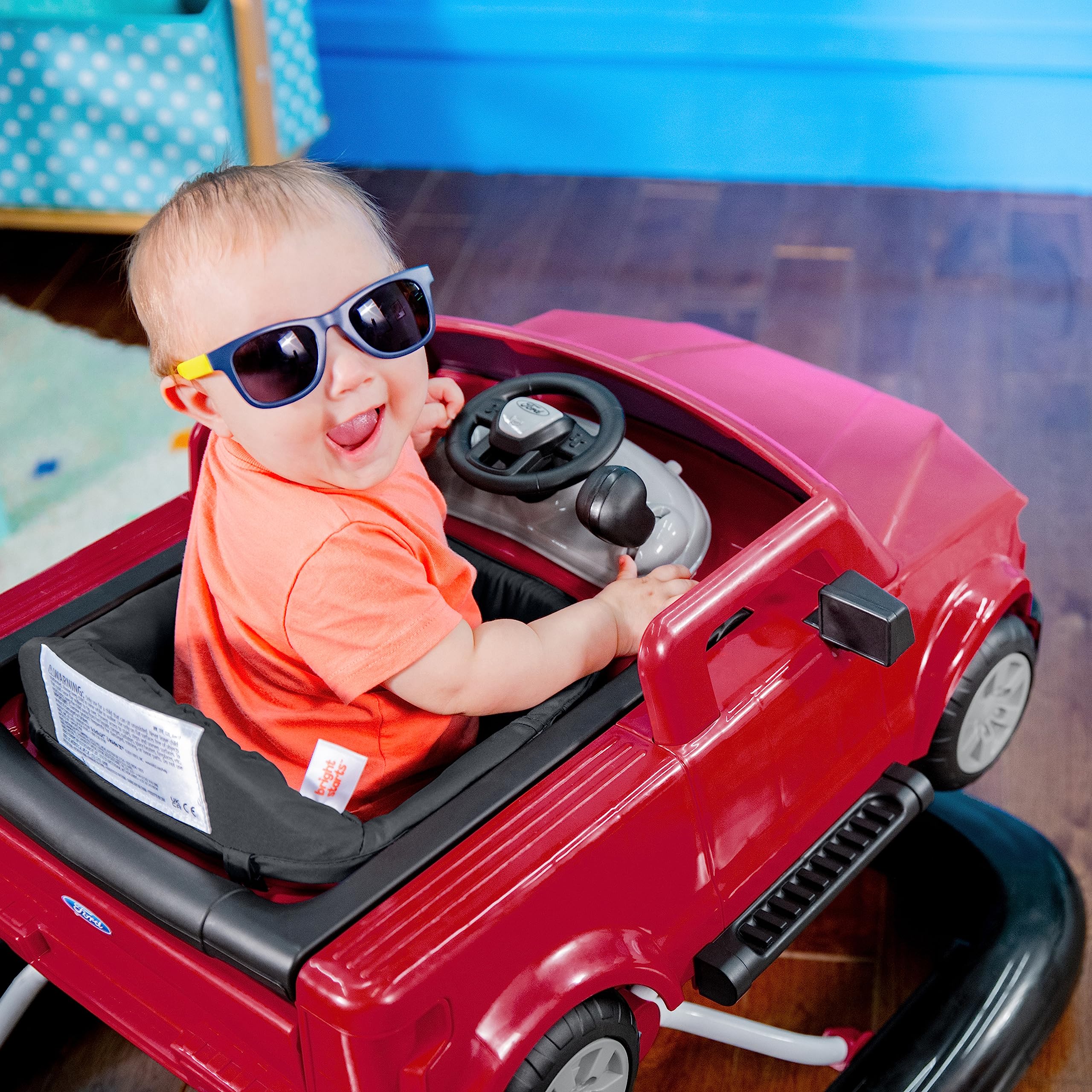 Bright Starts Ford F-150 4-in-1 Red Baby Activity Center & Push Walker with Removable Interactive Steering Wheel - Fun Learning Toy for Infants 6 Months and Up - Perfect for Playtime, Early Development & First Steps
