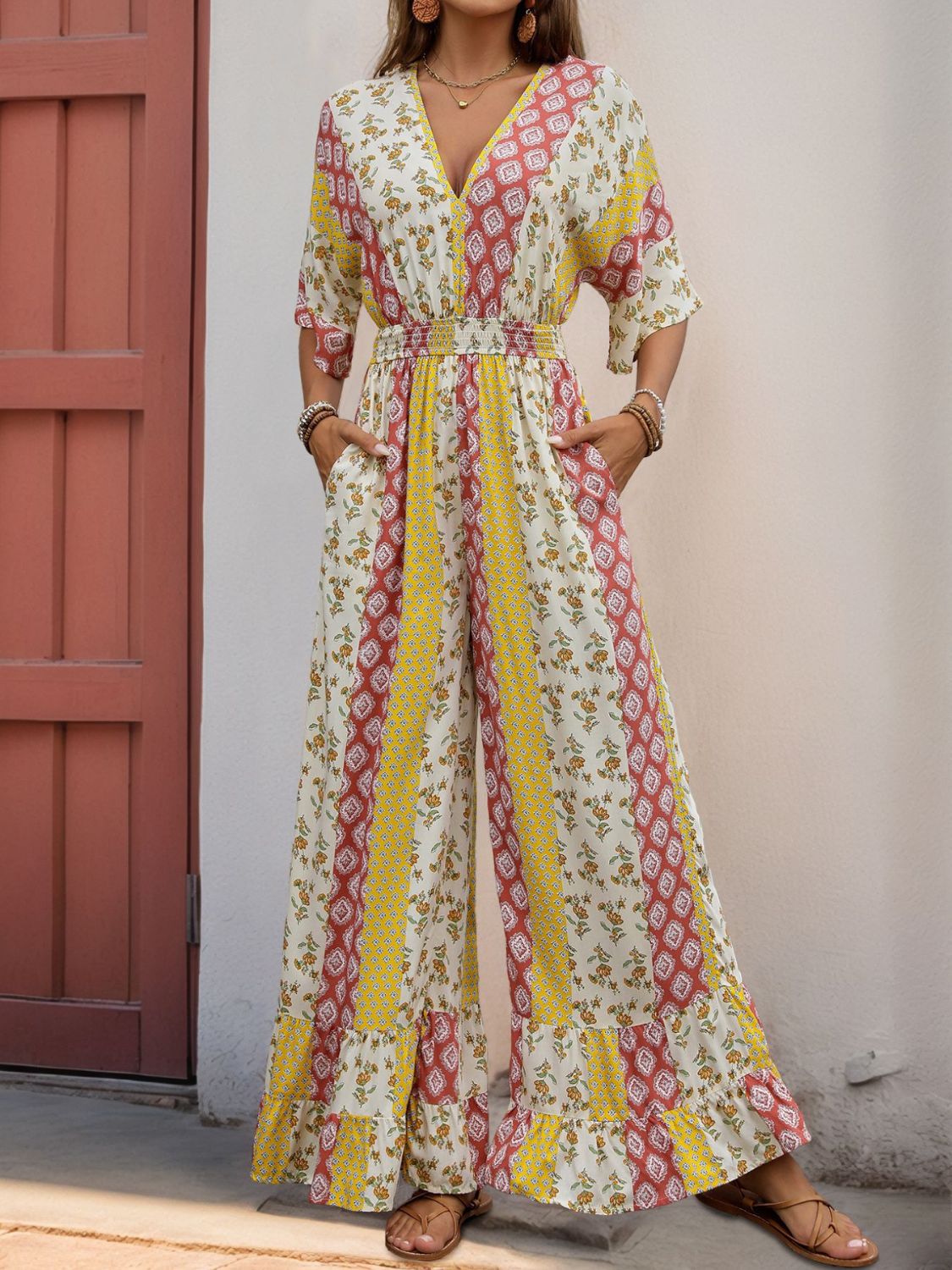 Boho Ruffled Hem Printed V-Neck Jumpsuit for Women - Floral Summer Romper with Pockets | Perfect for Beach Vacations, Music Festivals & Date Nights