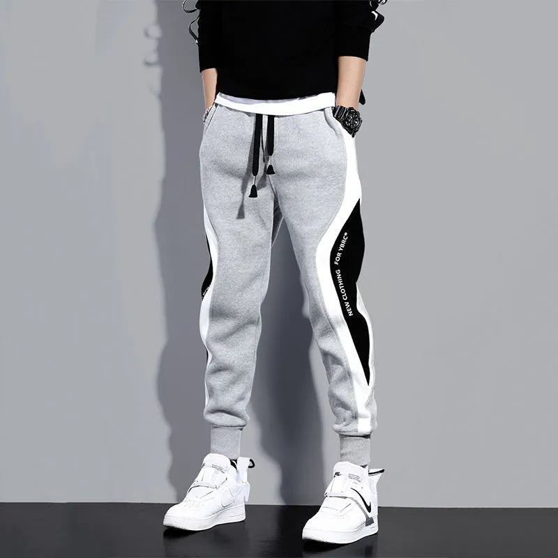 **Men's Wide Loose Casual Pants - Elastic Waist, Breathable Patchwork Nine-Point Trousers for Sports & Outdoor Activities | Perfect for Jogging, Travel, and Everyday Wear**