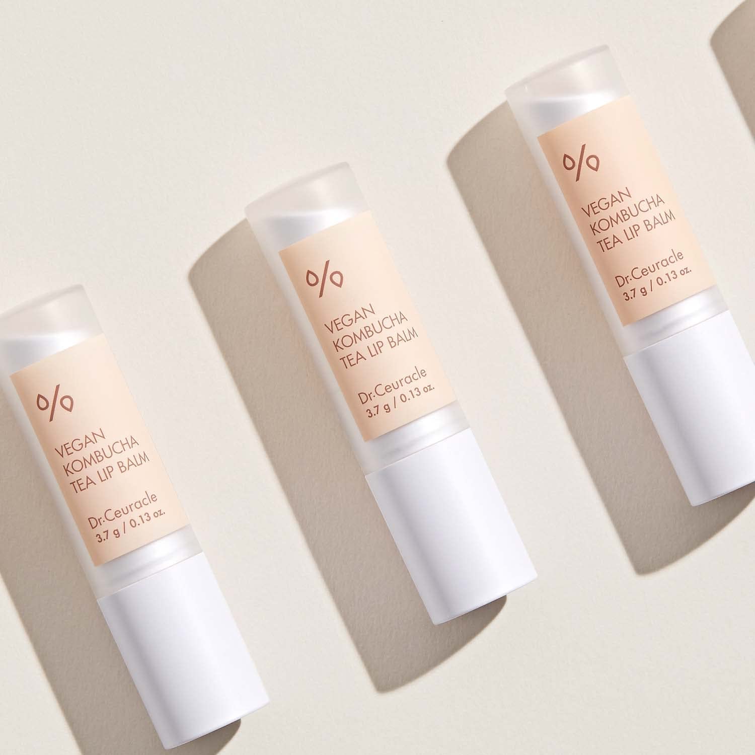 Dr. Ceuracle Vegan Kombucha Tea Lip Balm 3.7g - Cruelty Free Hydrating & Nourishing Lip Care for Dry, Cracked, Chapped Lips - Infused with Shea Butter & Botanical Squalene from Olives - Not Tested on Animals - Perfect for Daily Lip Moisturizing, Winter Care & On-The-Go Lip Protection