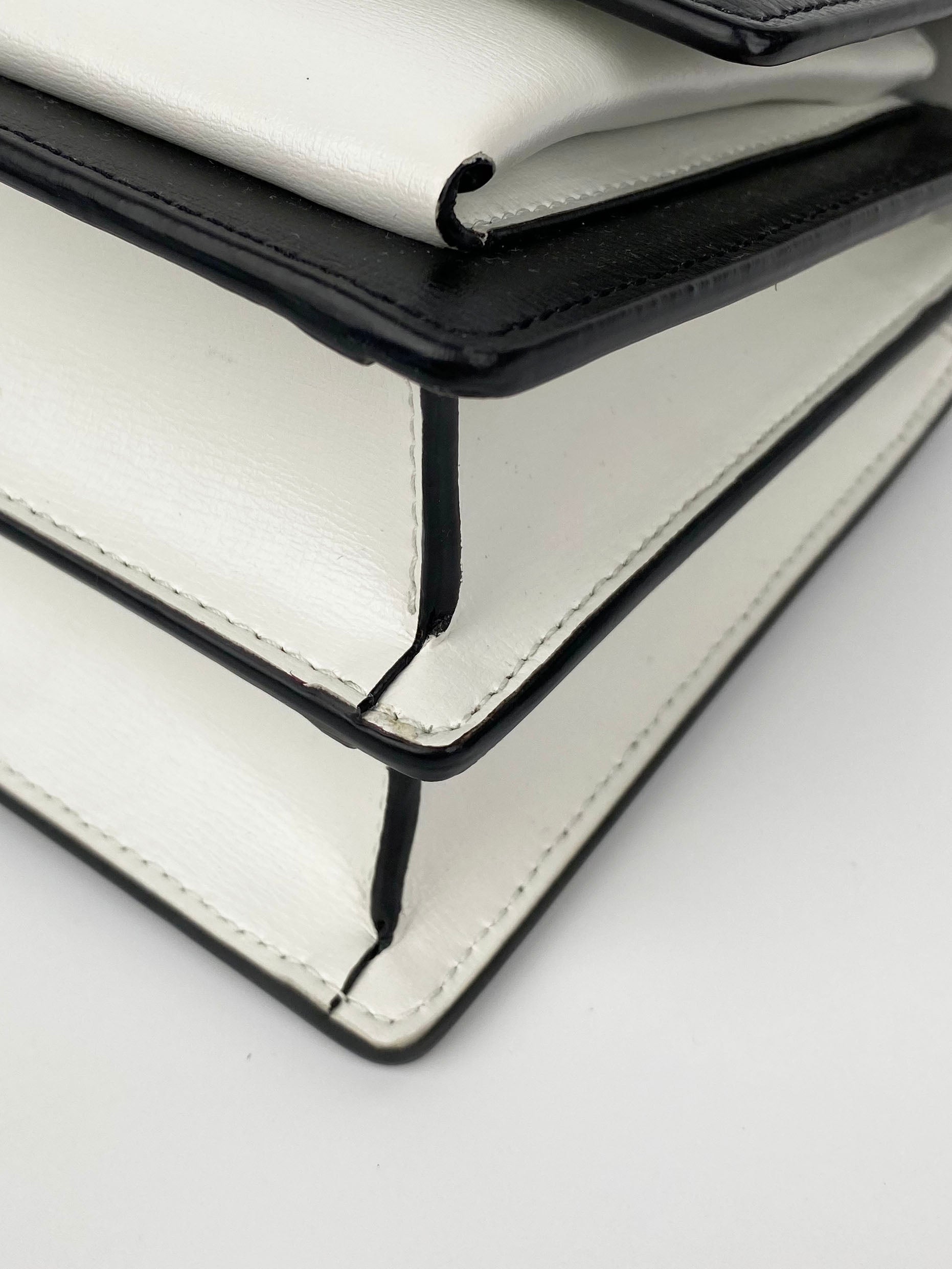 Saint Laurent Sunset Bag - Black & White Two-Tone Designer Handbag for Women | Perfect for Evening Parties, Date Nights & Luxury Fashion Accessories