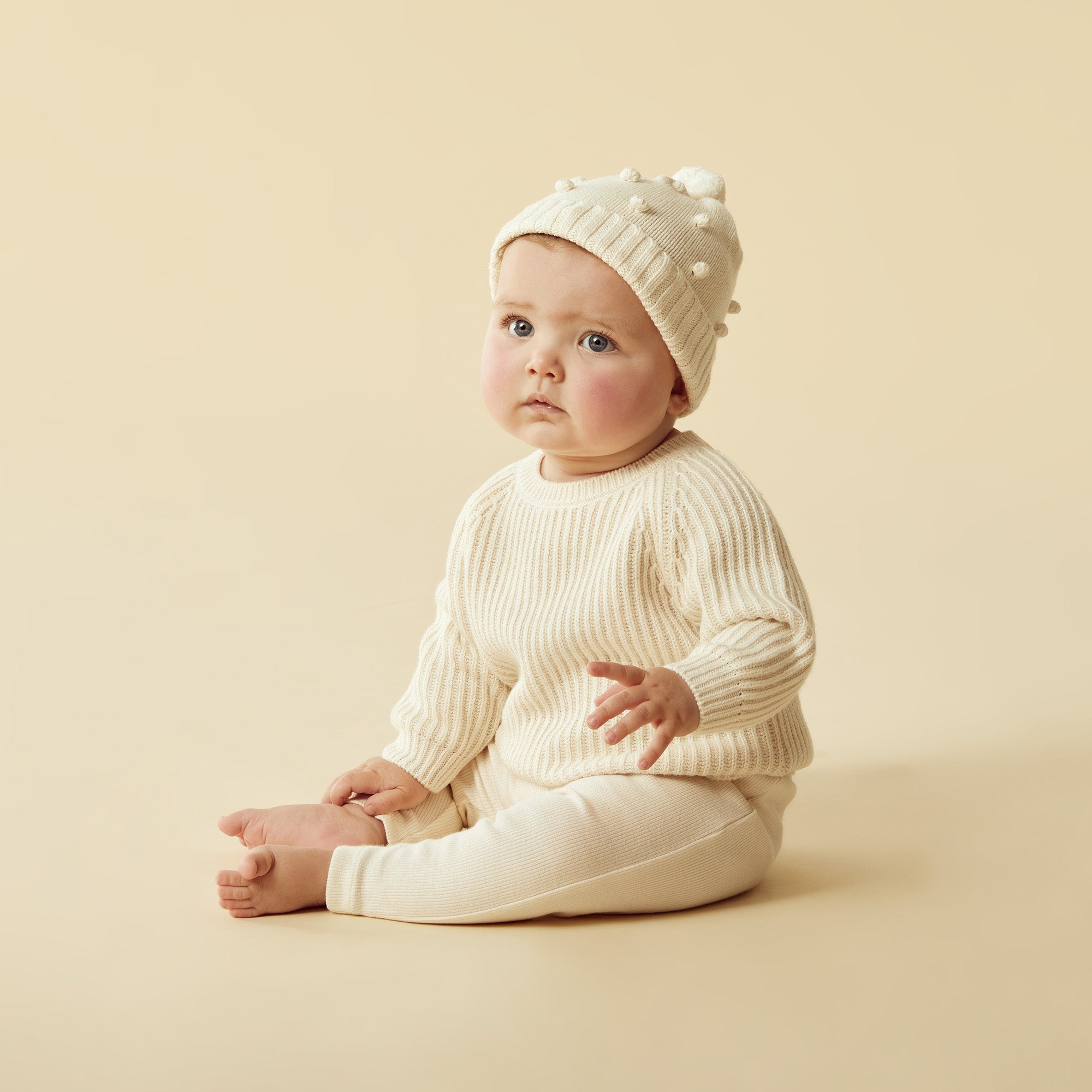 Cozy Ecru Knitted Bauble Hat for Women - Winter Beanie with Pom Pom - Perfect for Cold Weather, Outdoor Activities & Fashion Accessories