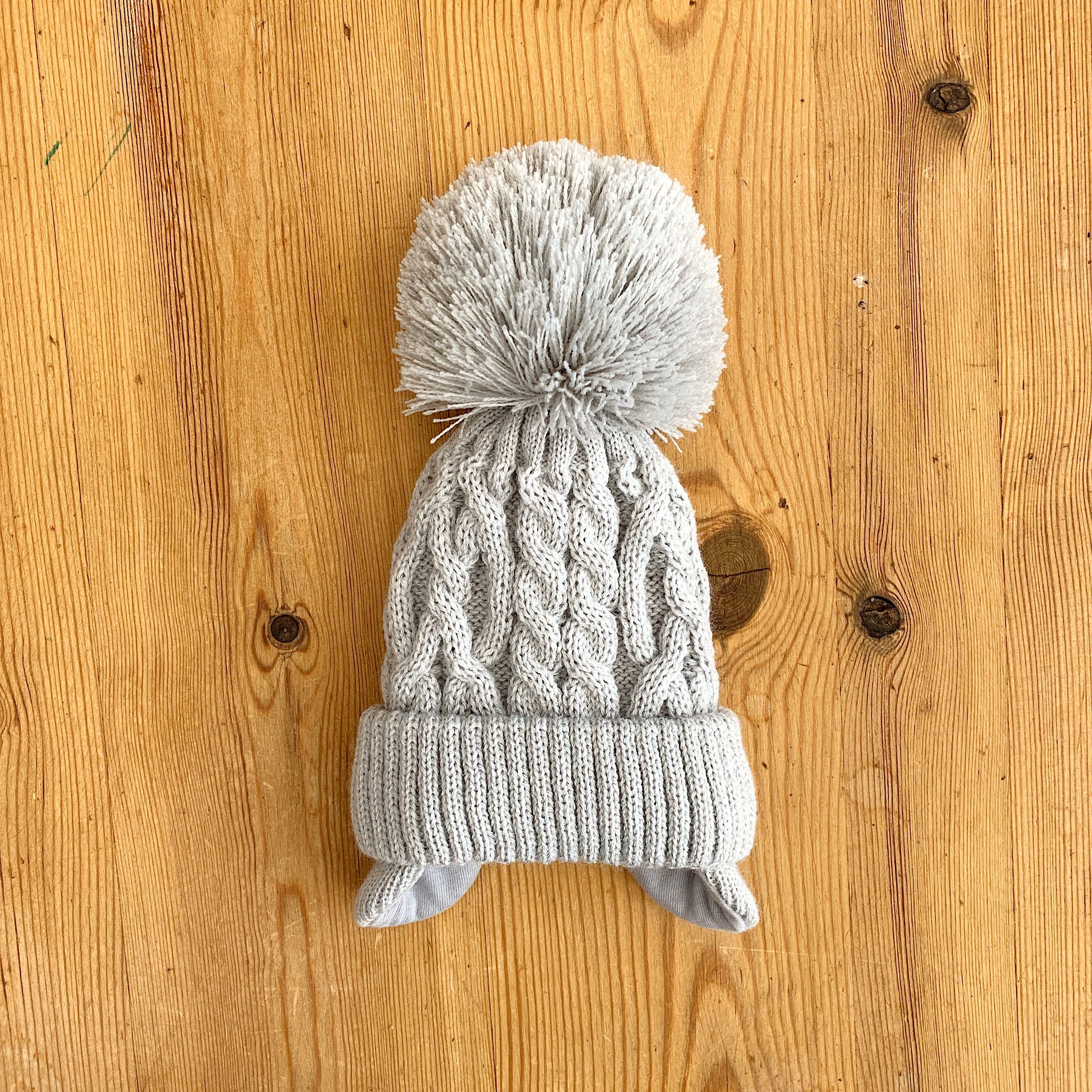 Cozy Cable Knit Pom Pom Hat with Ear Flaps - Winter Beanie for Women & Men - Perfect for Skiing, Snowboarding & Cold Weather Activities