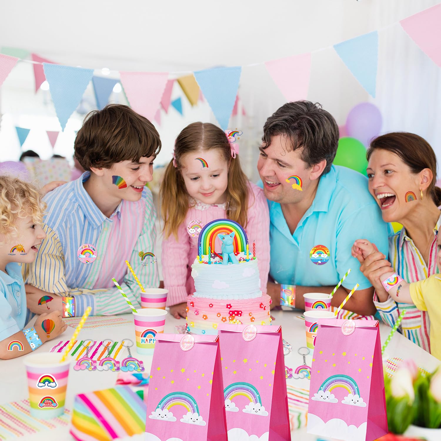 110-Piece Rainbow Party Favors Set - Slap Bracelets, Button Pins, Stickers, Temporary Tattoos & Key Chains - Perfect for Kids Birthday Parties, Baby Showers & Unicorn Themed Celebrations - Includes Gift Bags & Decorations for Boys & Girls