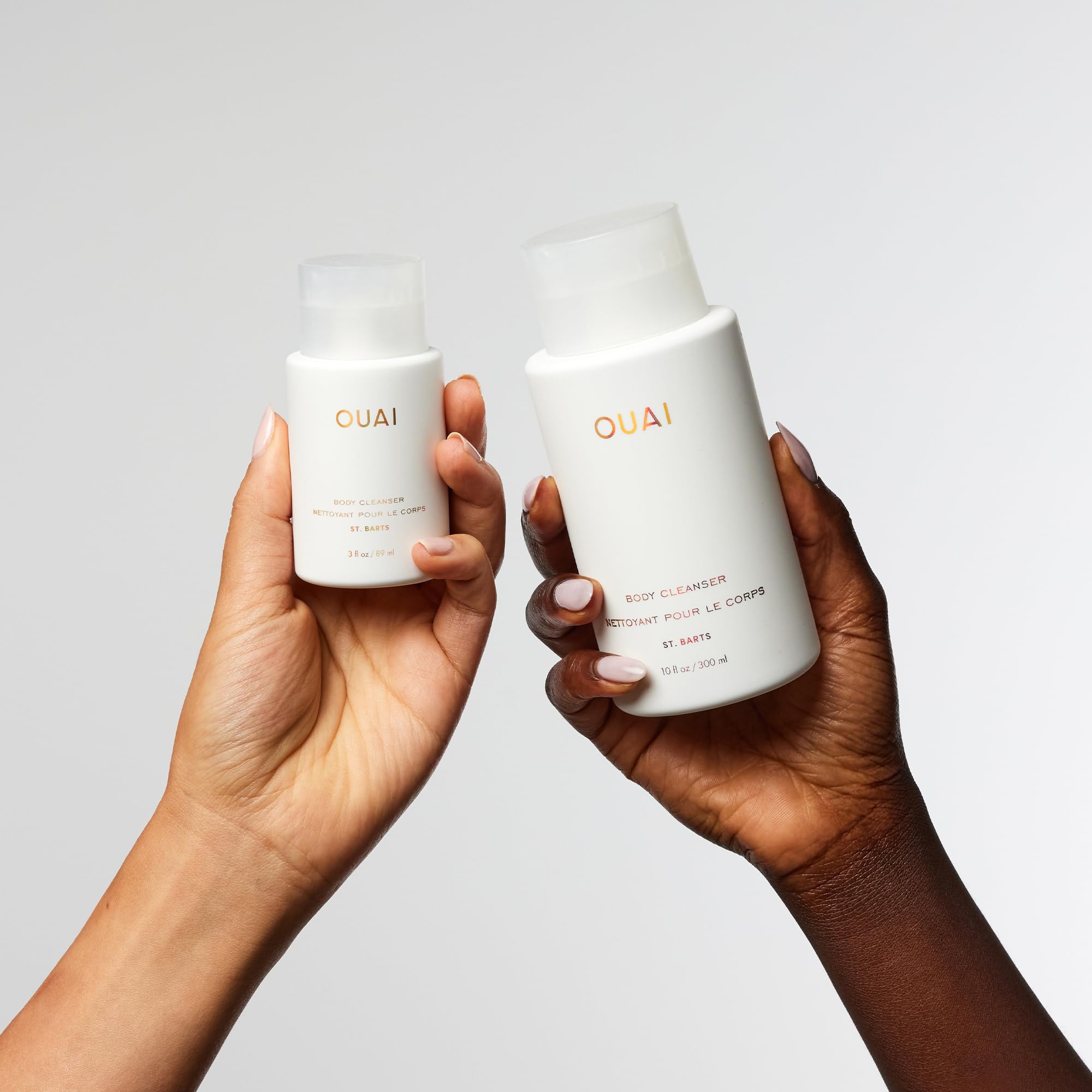 OUAI St. Barts Hydrating Body Wash Bundle - Moisturizing Foaming Body Cleanser with Jojoba Oil & Rosehip Oil for Soft, Balanced Skin - Paraben, Phthalate & Sulfate Free Skincare Set (2 Pack: 3oz Travel Size + 10oz) - Perfect for Shower, Gym Bag & Vacation Essentials