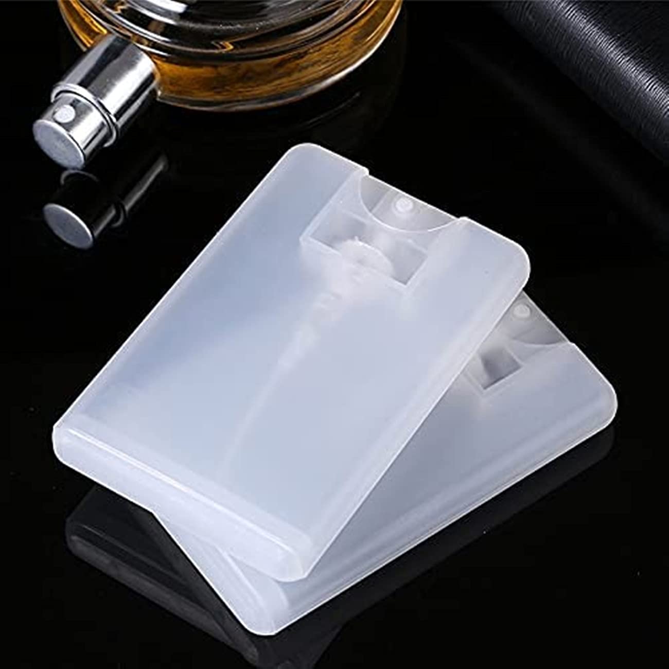 20 Pack 20ml Clear Refillable Plastic Perfume Spray Bottles - Fine Mist Empty Containers for Perfume, Moisturizing Water & Skincare - Travel Size, DIY Beauty, Makeup Setting Spray & Aromatherapy
