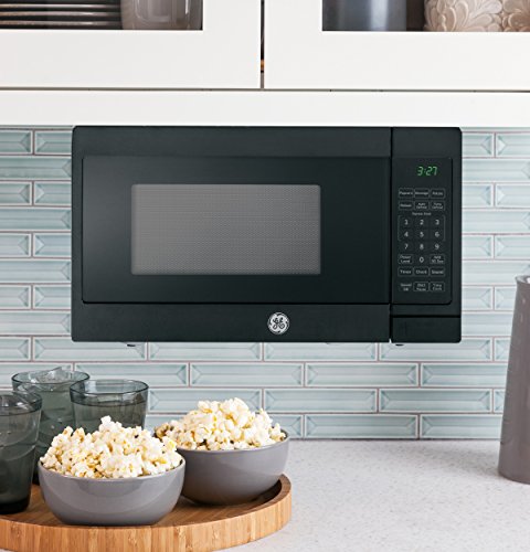 GE 0.7 Cu. Ft. 700W Countertop Microwave Oven with Hanging Kit - Compact Black Microwave for Small Kitchens, Dorms & Apartments - Perfect for Quick Meals, Reheating & Defrosting