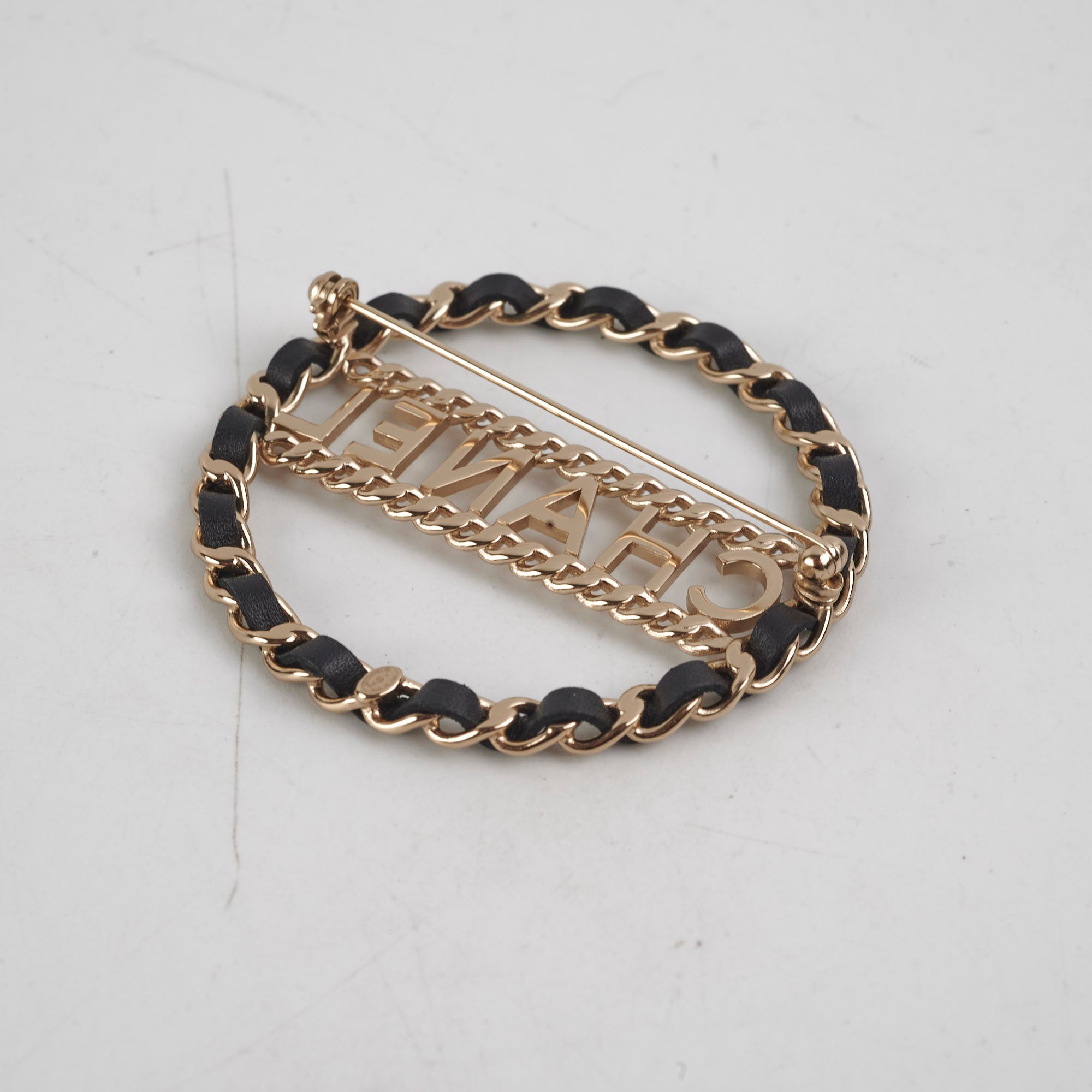 Chanel CC Round Black and Gold Brooch - Elegant Fashion Accessory for Women, Perfect for Dresses, Jackets, and Bags