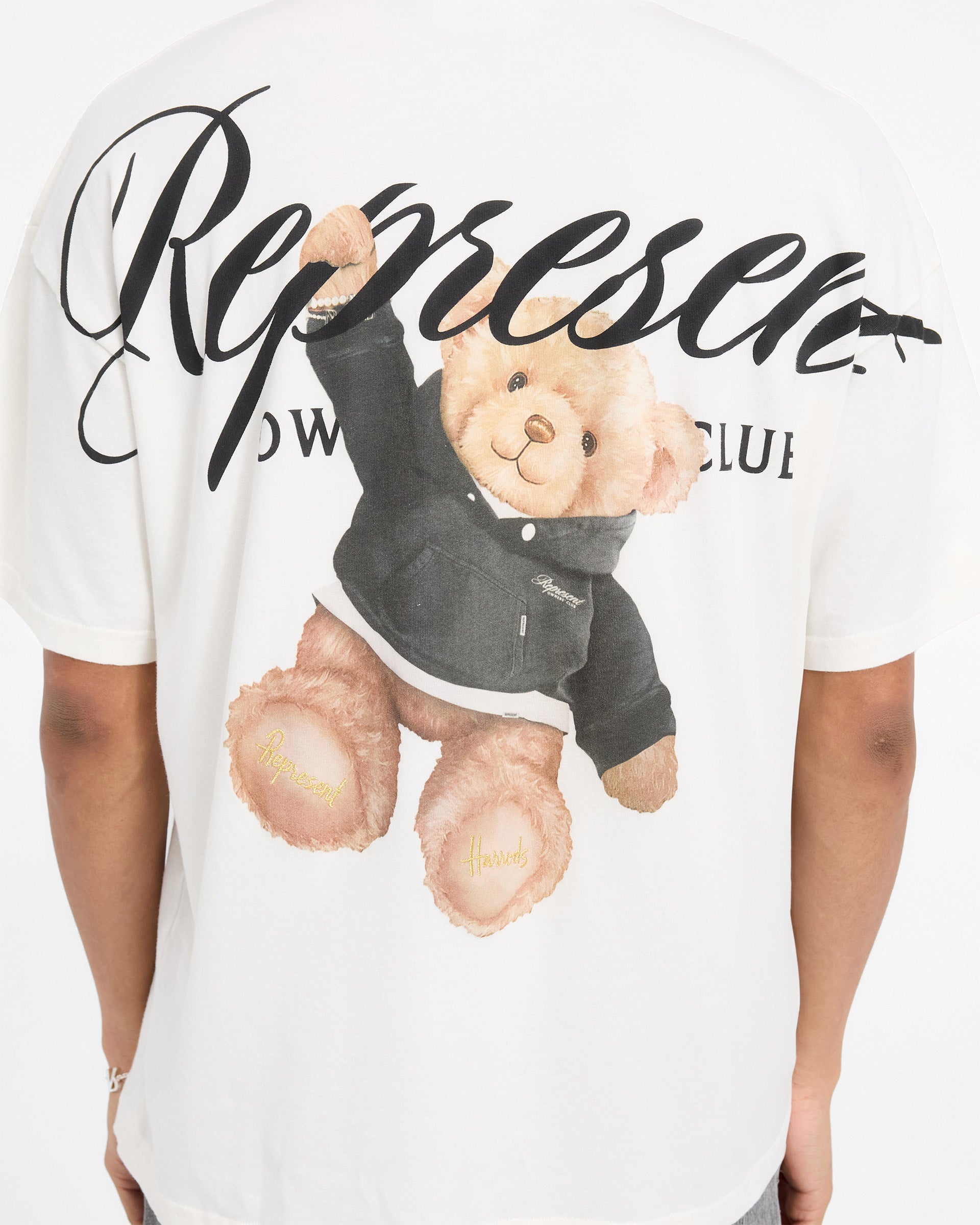 Represent X Harrods Bear Owners Club Graphic T-Shirt - Flat White | Casual Streetwear for Men & Women | Perfect for Everyday Wear & Outings
