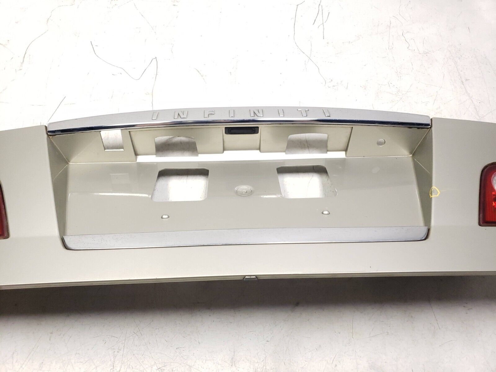 06-09 Infiniti M35 Trunk Trim Molding & License Plate Panel - OEM Replacement Part for Car Body Repair & Customization
