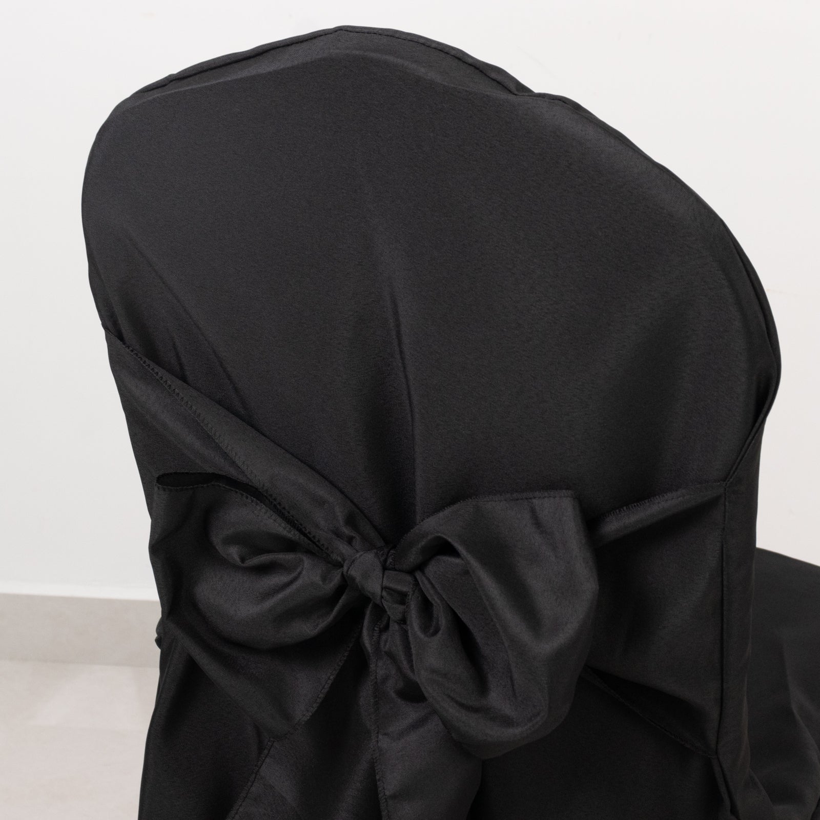 10 Pack Black Polyester Slip-On Banquet Chair Covers with Attached Sashes - Reusable Stain Resistant Chair Covers for Wedding, Party & Event Decor - Perfect for Banquet Halls, Restaurants and Home Celebrations