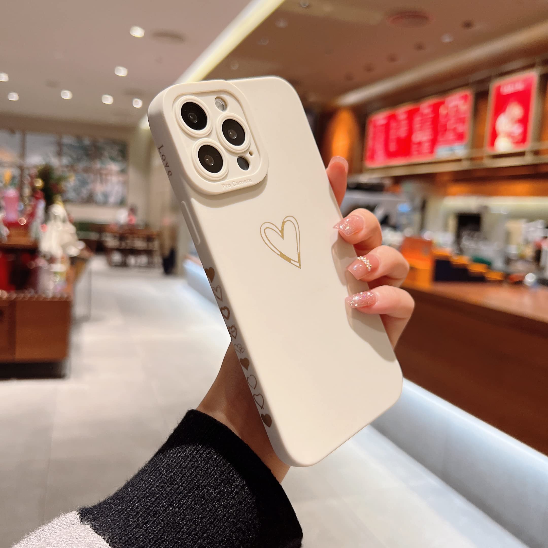 Qokey iPhone 13 Pro Max Case (2021 6.7 Inch) - Cute Heart Plated Shockproof TPU Cover with Anti-Fall Camera Protection & Anti-Fingerprint Coating | Perfect Gift for Women, Girls & Men (White) | Ideal for Everyday Use, Travel & Outdoor Activities