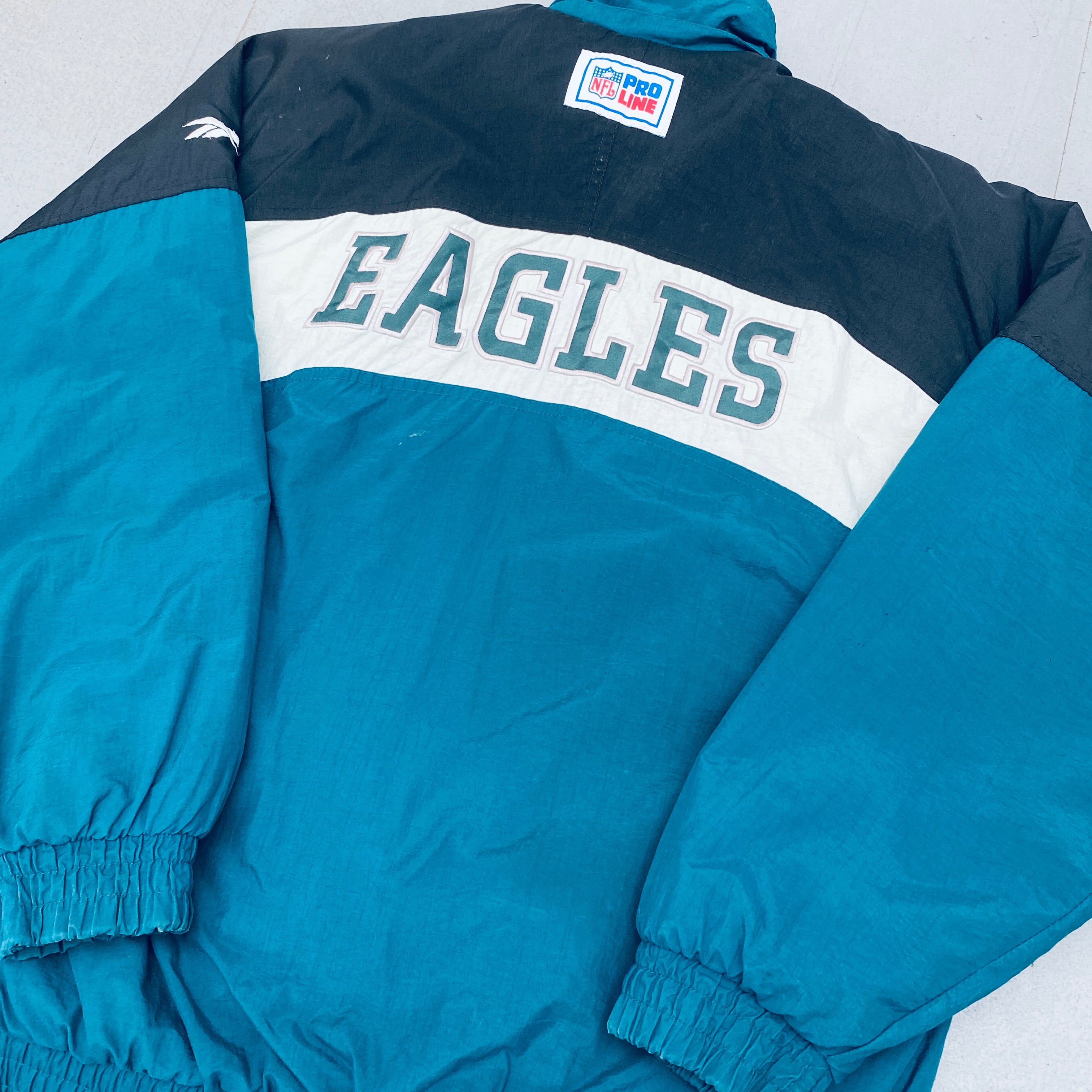 Philadelphia Eagles 1990s Reebok Reverse Spellout Full-Zip Proline Jacket for Men - Vintage NFL Football Fan Gear for Game Day & Casual Wear