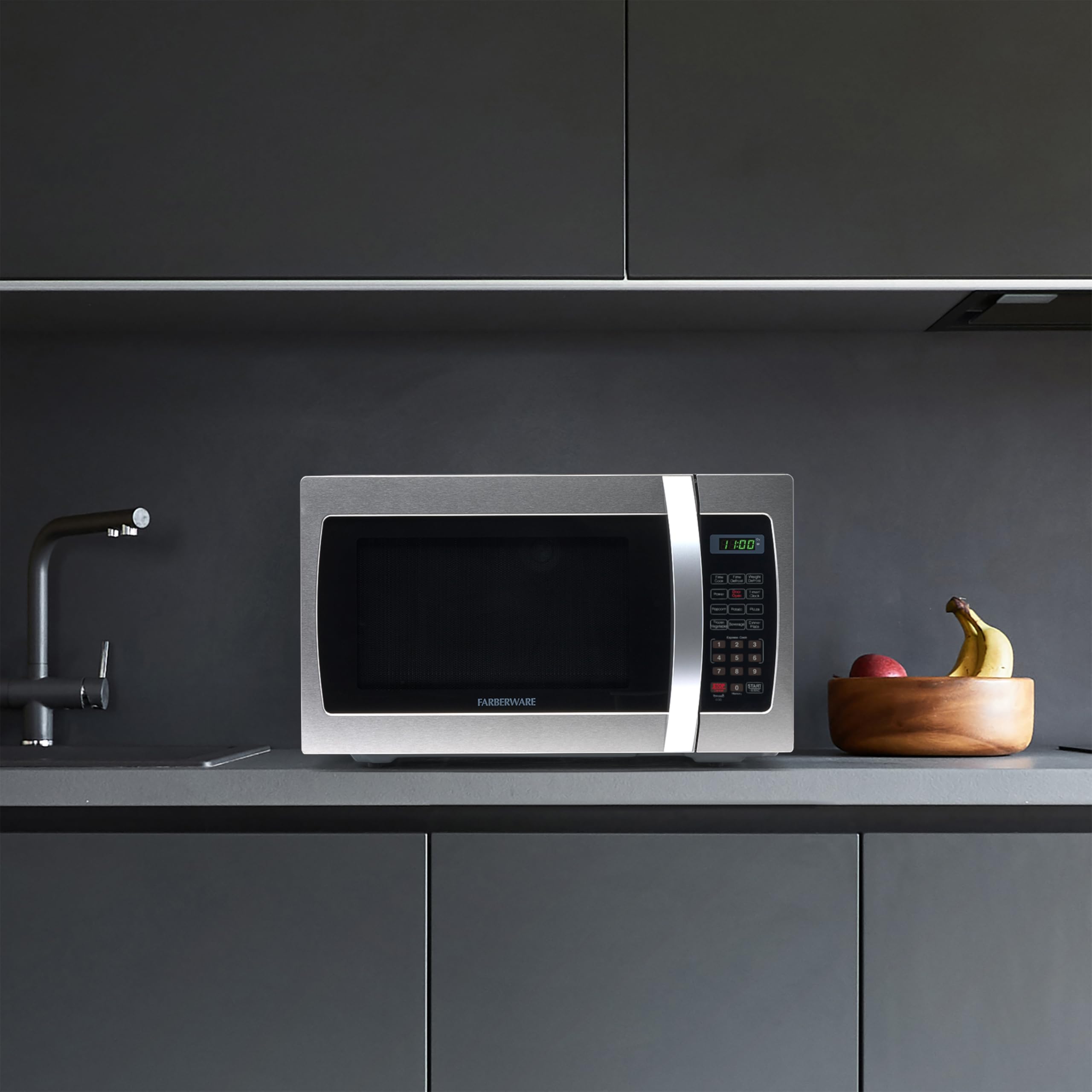 Farberware 1000W 1.3 Cu. Ft. Countertop Microwave Oven with LED Lighting & Child Safety Lock - Stainless Steel Interior for Easy Cleaning - Ideal for Small Kitchens, Apartments, Dorms & Office Break Rooms