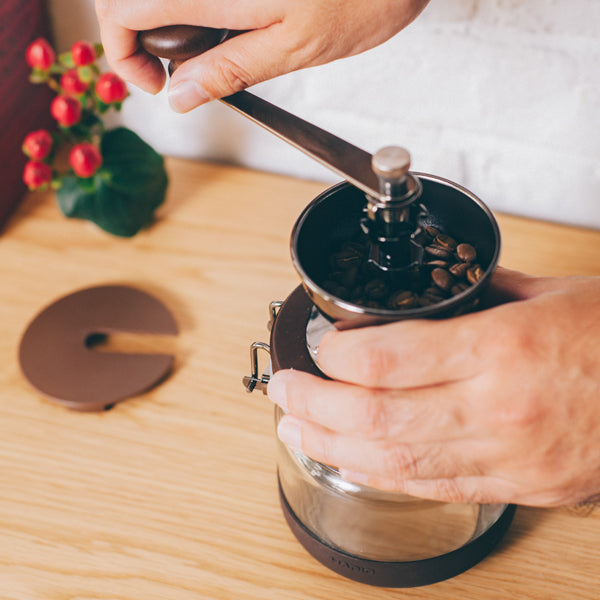 Hario Canister Coffee Grinder - Manual Ceramic Burr Mill for Fresh Ground Coffee - Perfect for Home, Office, and Travel Use