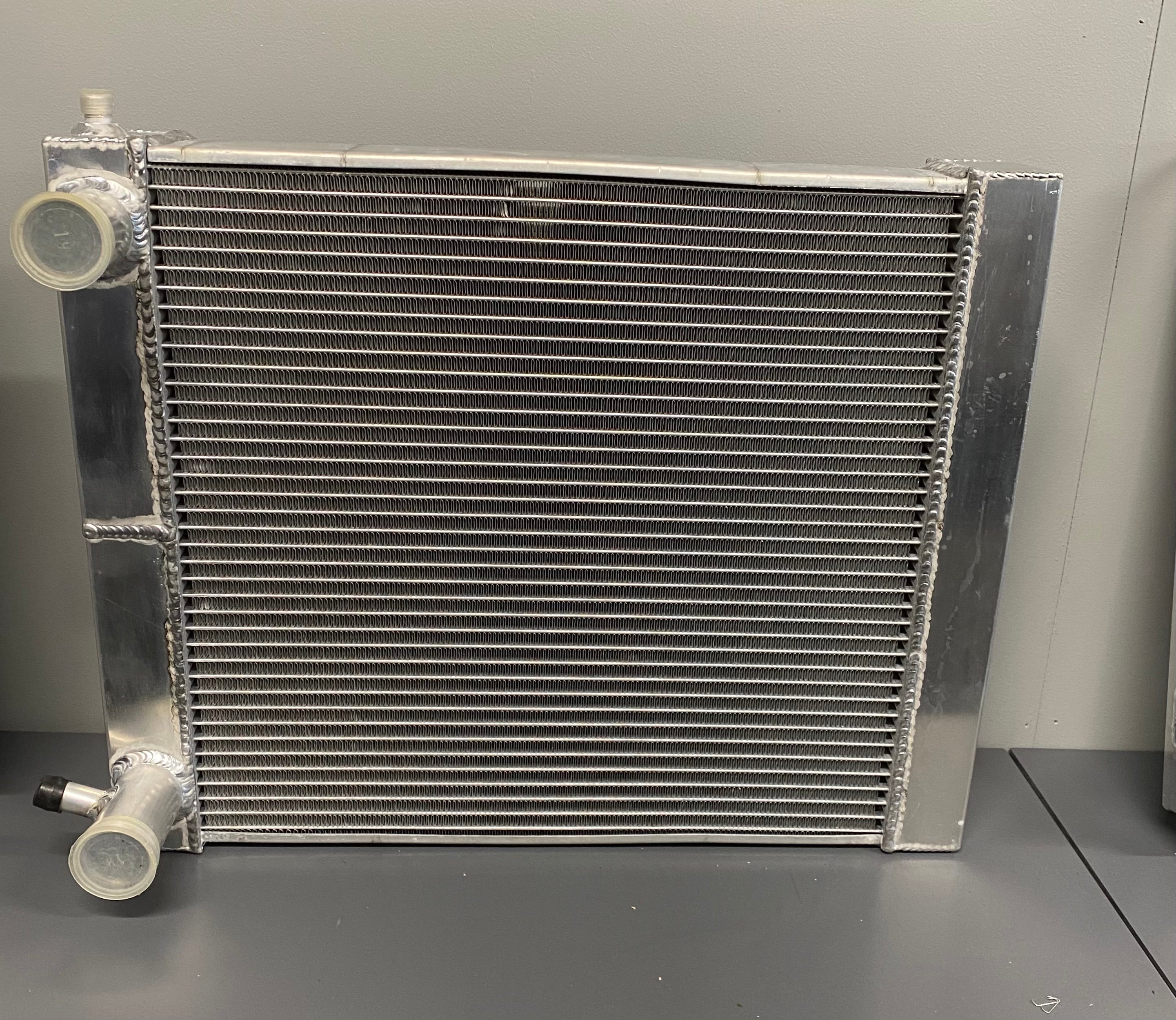 Universal Radiator with Left or Right Hand Outlets - Compatible with Most Vehicles for Home and Auto Repair