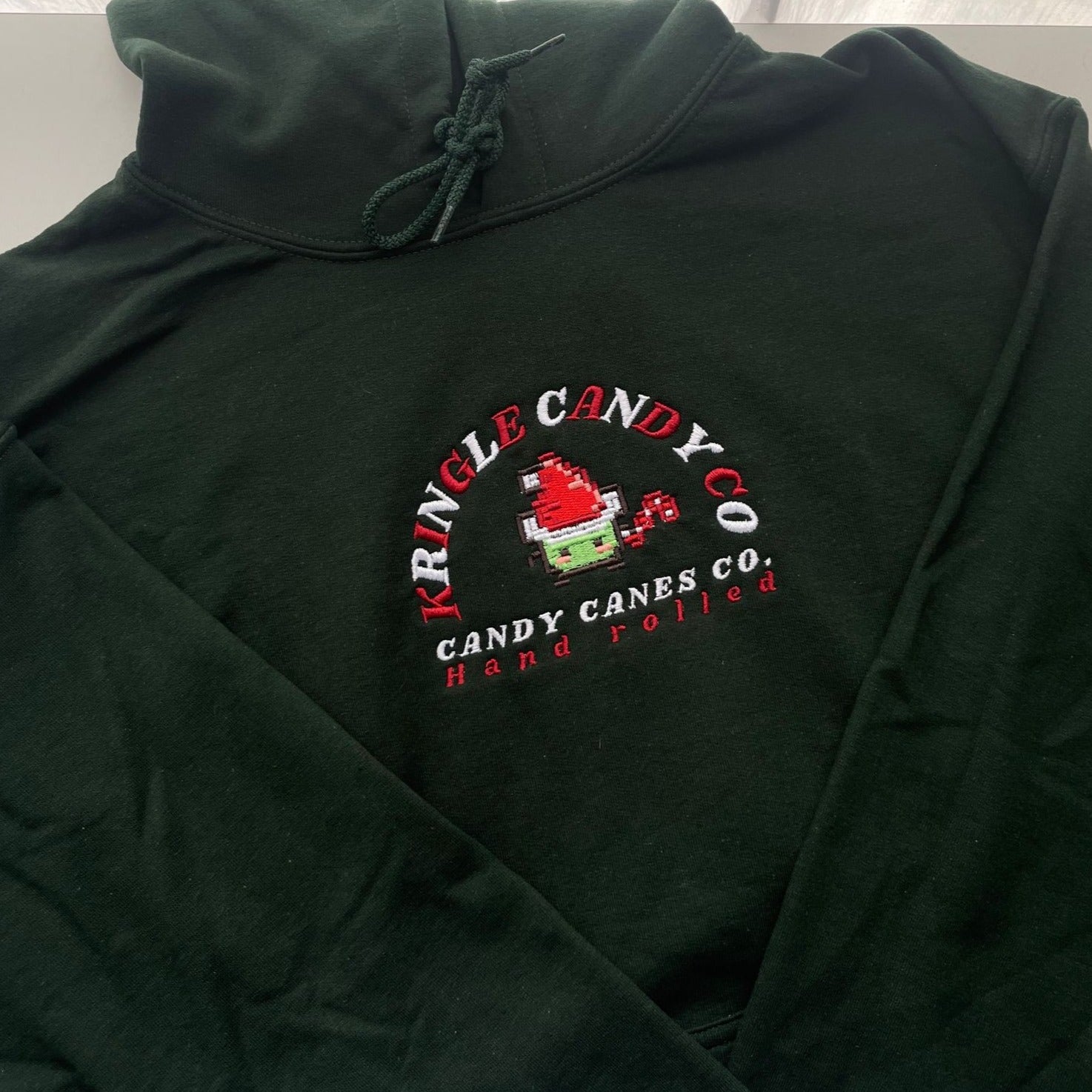 Junimo Hoodie with Candy Cane Design - Cozy Gamer Sweatshirt for Christmas & Stardew Valley Fans