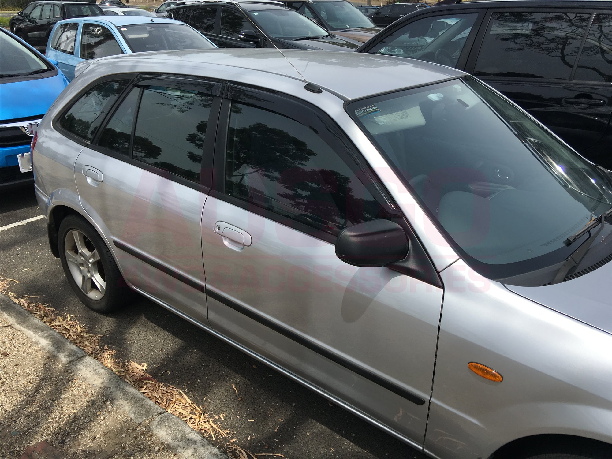 Premium Car Weather Shields for Ford Laser Hatchback 5-Door (1998-2002) - Rain & Sun Protection for All-Season Driving Comfort