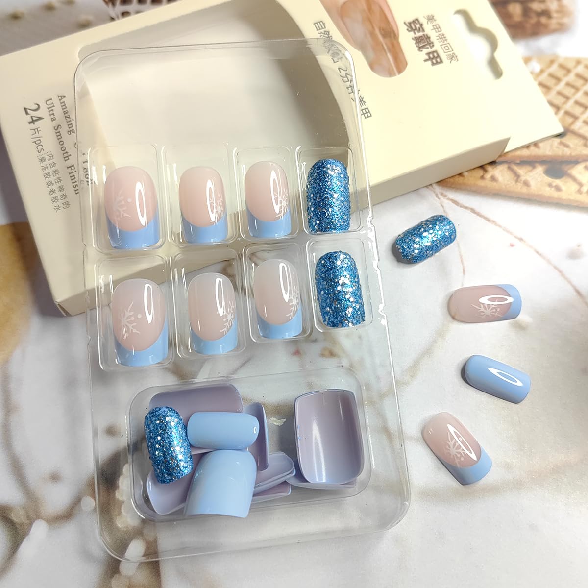 24Pcs Christmas Press on Nails - Medium Square Fake Nails with Snowflake & Blue Glitter French Tip Design, Full Cover Acrylic Glue on Artificial Nails for Women | Perfect for Holiday Parties, Gift Giving & Winter Manicures