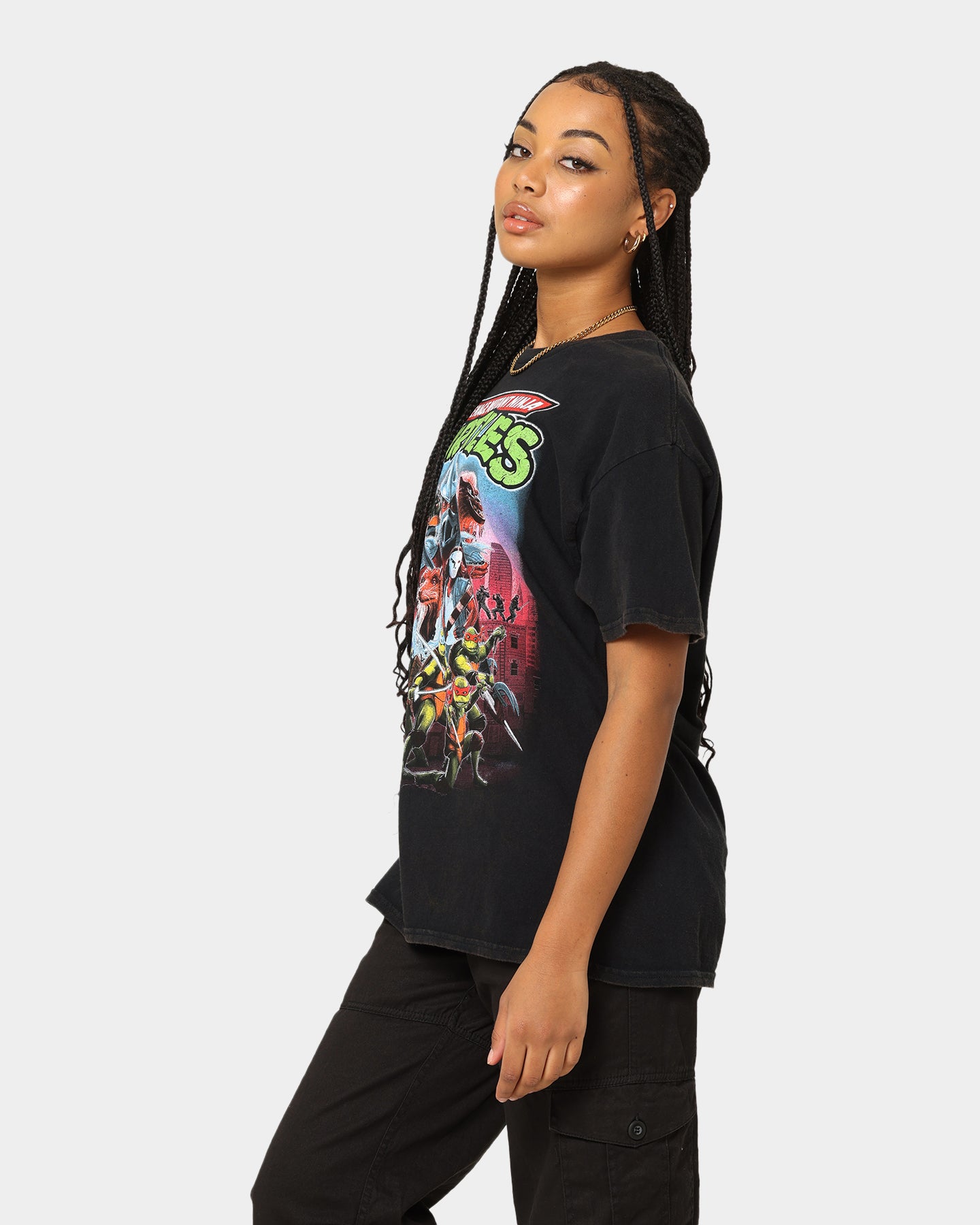 Vintage Black Teenage Mutant Ninja Turtles Graphic T-Shirt | Retro TMNT Merchandise | Perfect for Cosplay, Comic Con & 90s Nostalgia Fans