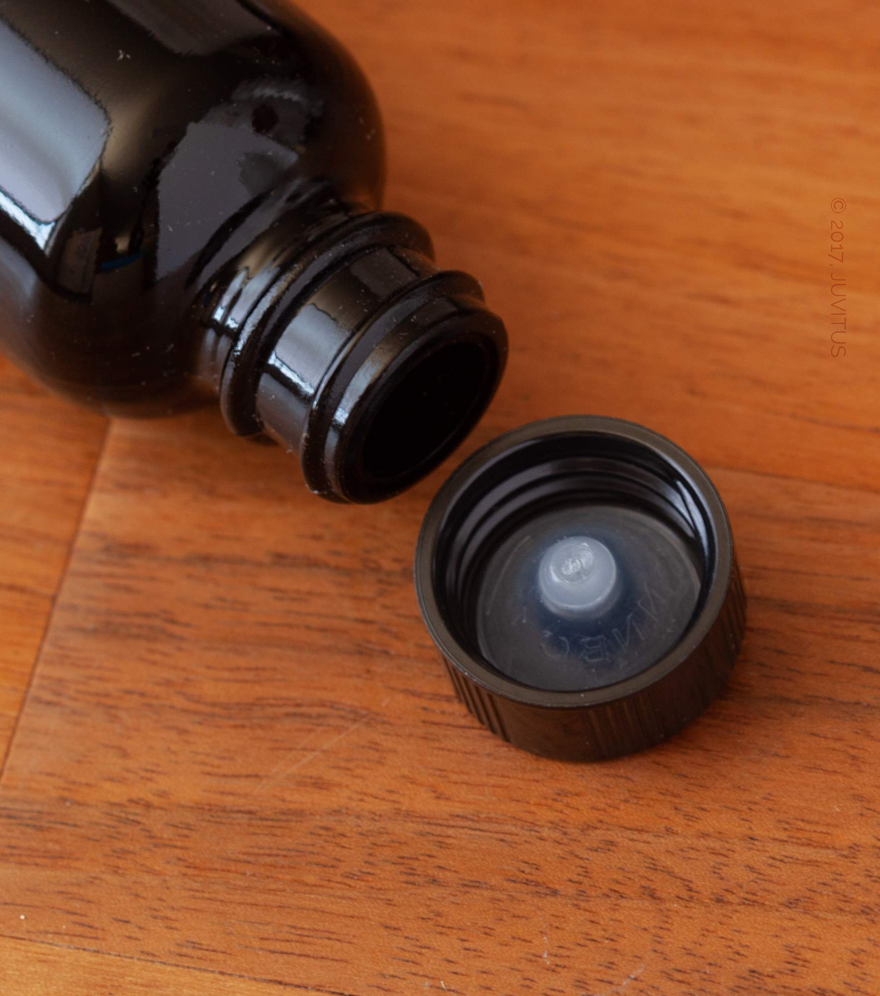 Premium 1 oz Black Glass Boston Round Bottle with Black Phenolic Cap & Funnel - Set of 12 for Essential Oils, Perfumes & DIY Beauty Products - Luxury Apothecary Packaging for Home & Professional Use