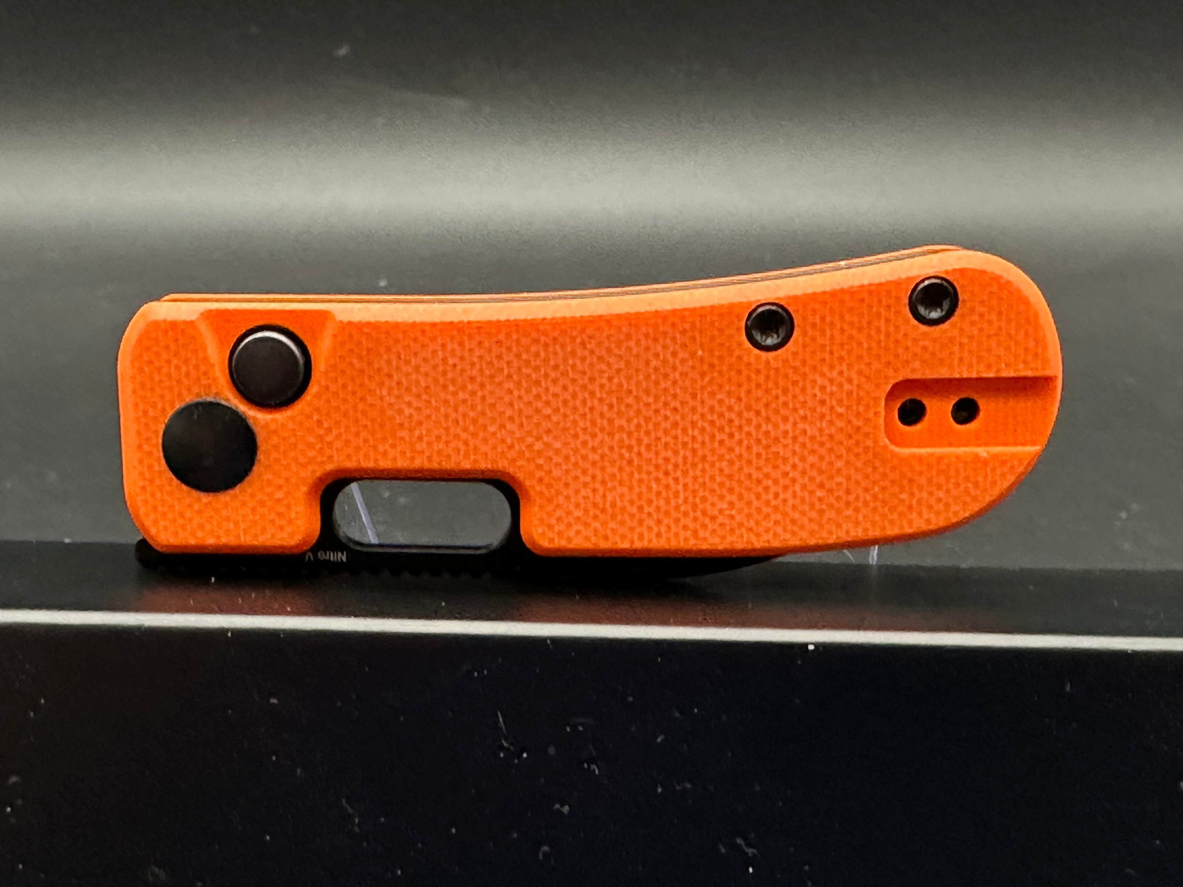 Kizer Banish Folding Knife - Nitro V Steel Blade, Button Lock, Orange Textured G10 Handle - EDC Pocket Knife for Outdoor, Camping & Everyday Carry