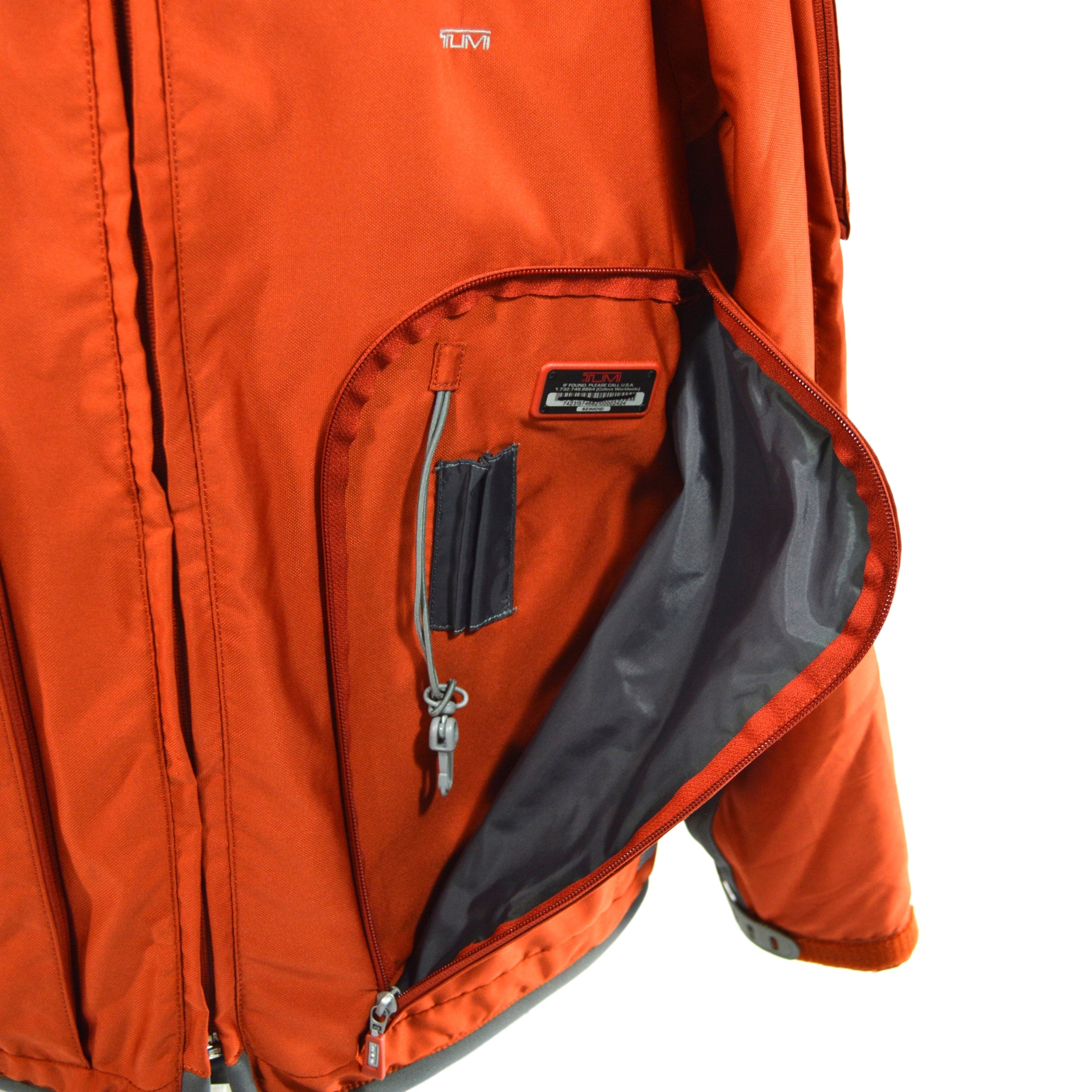 Pre-Owned TUMI Travel Jacket - Medium Size in Burnt Orange & Gray with Large Pockets | Perfect for Business Trips & Outdoor Adventures