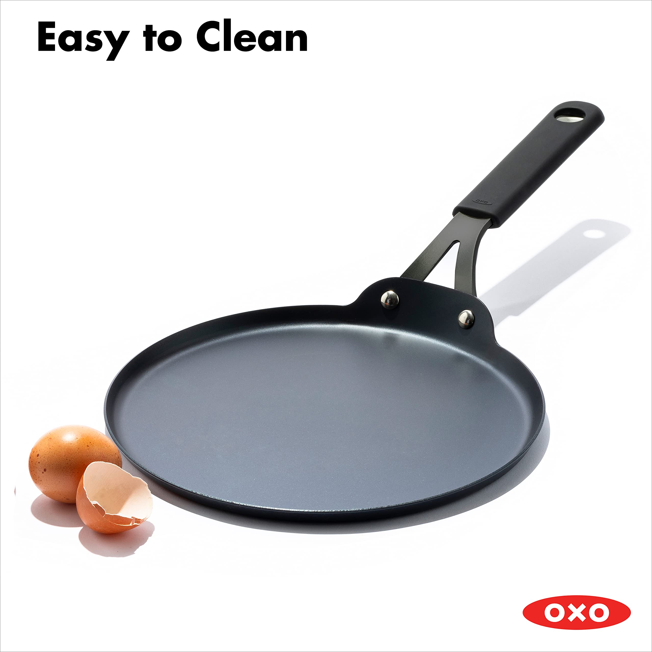 OXO Obsidian Pre-Seasoned 10-Inch Carbon Steel Crepe & Pancake Griddle Pan - Induction & Oven Safe with Removable Silicone Handle Holder - Perfect for Breakfast, Brunch & Camping Cooking - Black