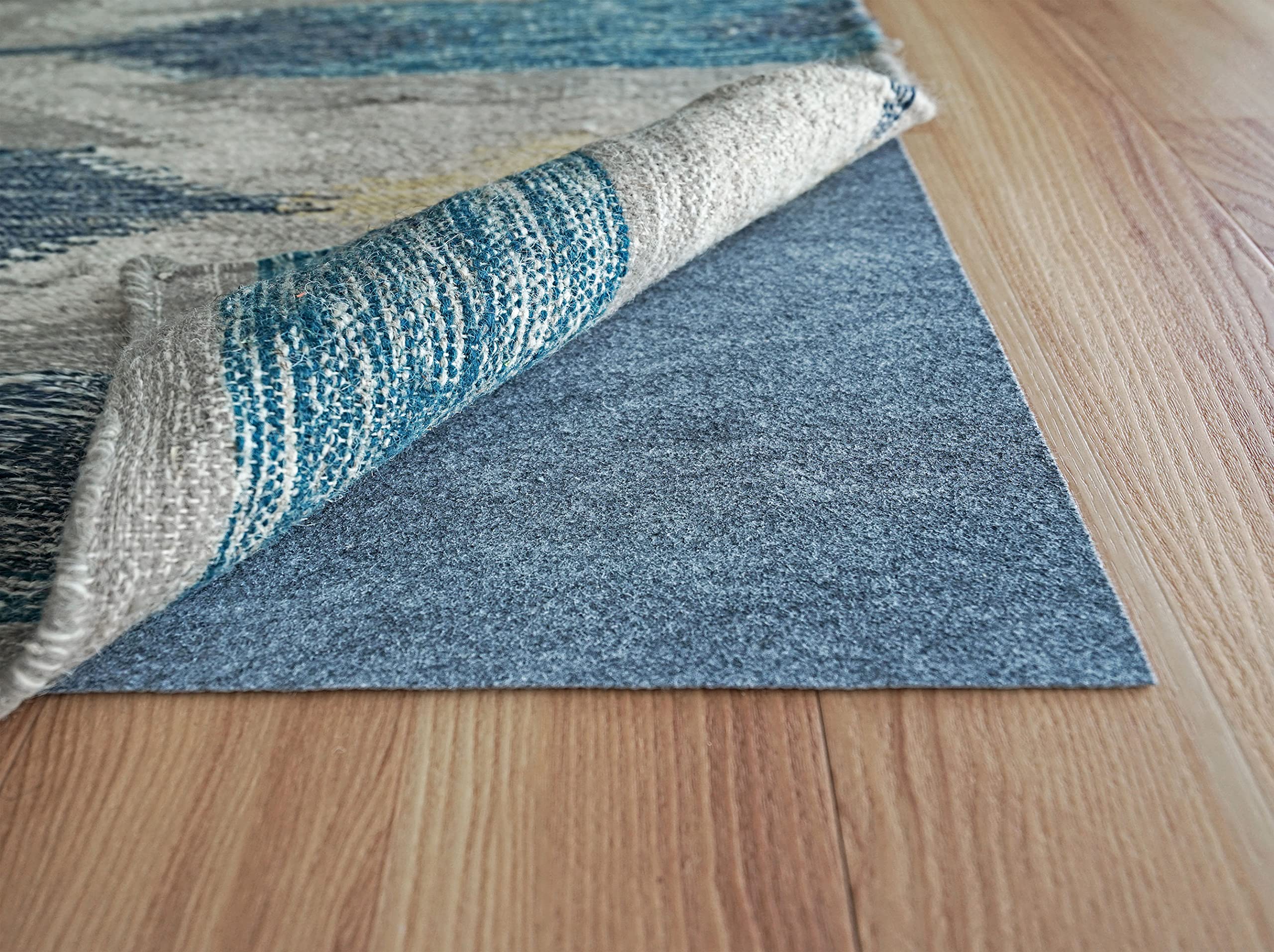 RUGPADUSA Non-Slip Rug Pad 6x9 Feet - Dual Surface Felt & Rubber - 1/10 Inch Thick Low Profile Rug Underlay - Made in USA for Living Room, Bedroom, Office Floor Protection