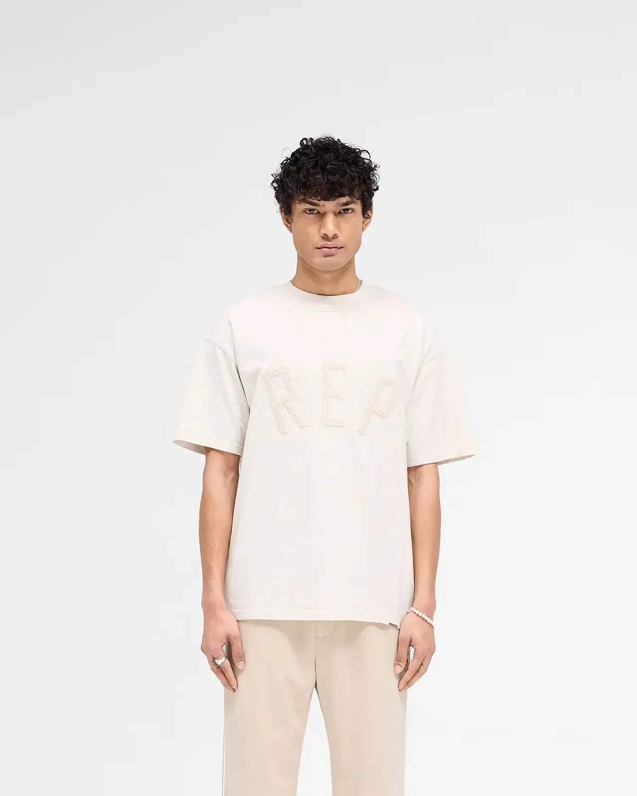 REPRESENT Applique Graphic T-Shirt for Men - Trendy Streetwear Fashion Tee for Casual Outfits and Urban Style